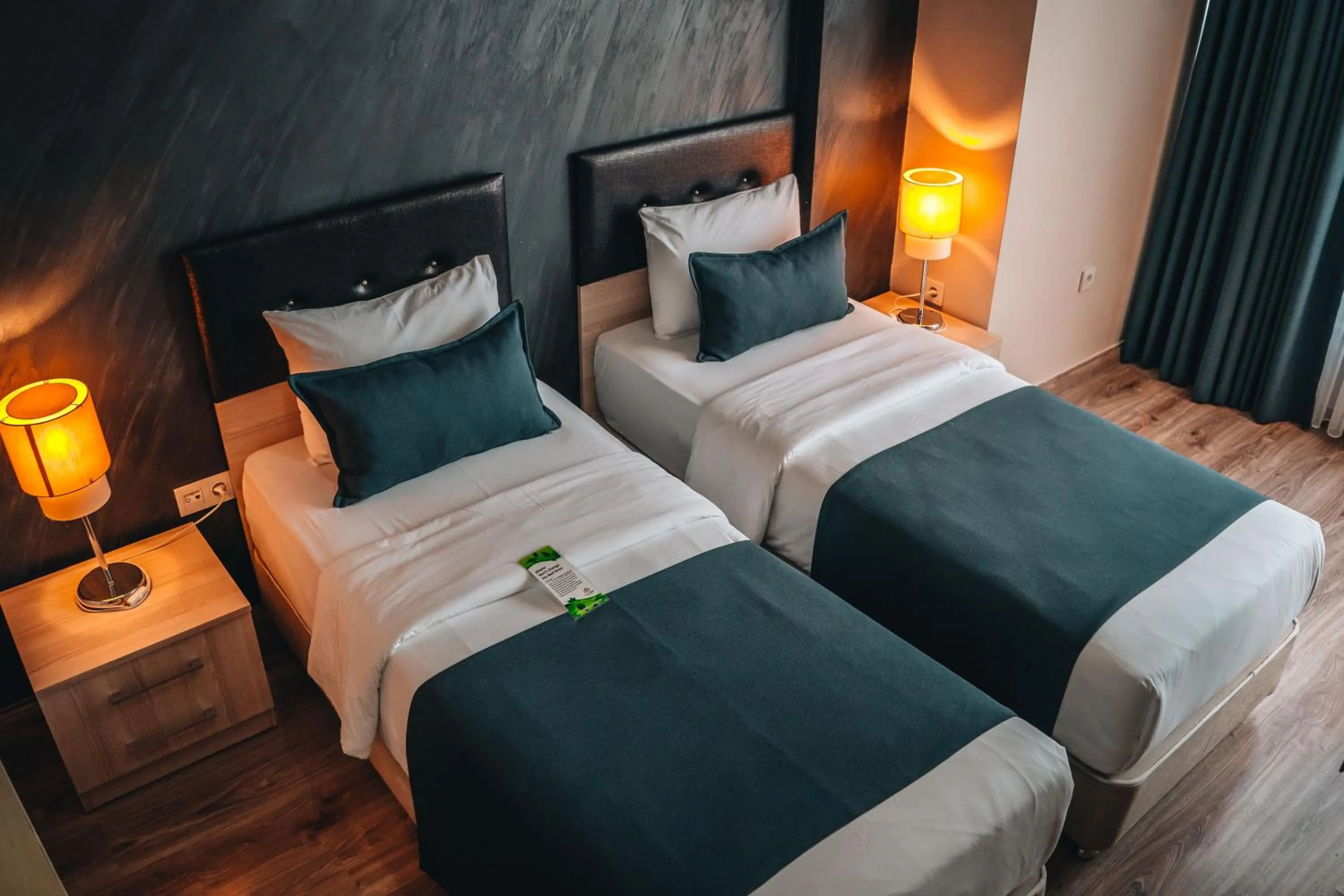 Bed in La Flora House Hotel