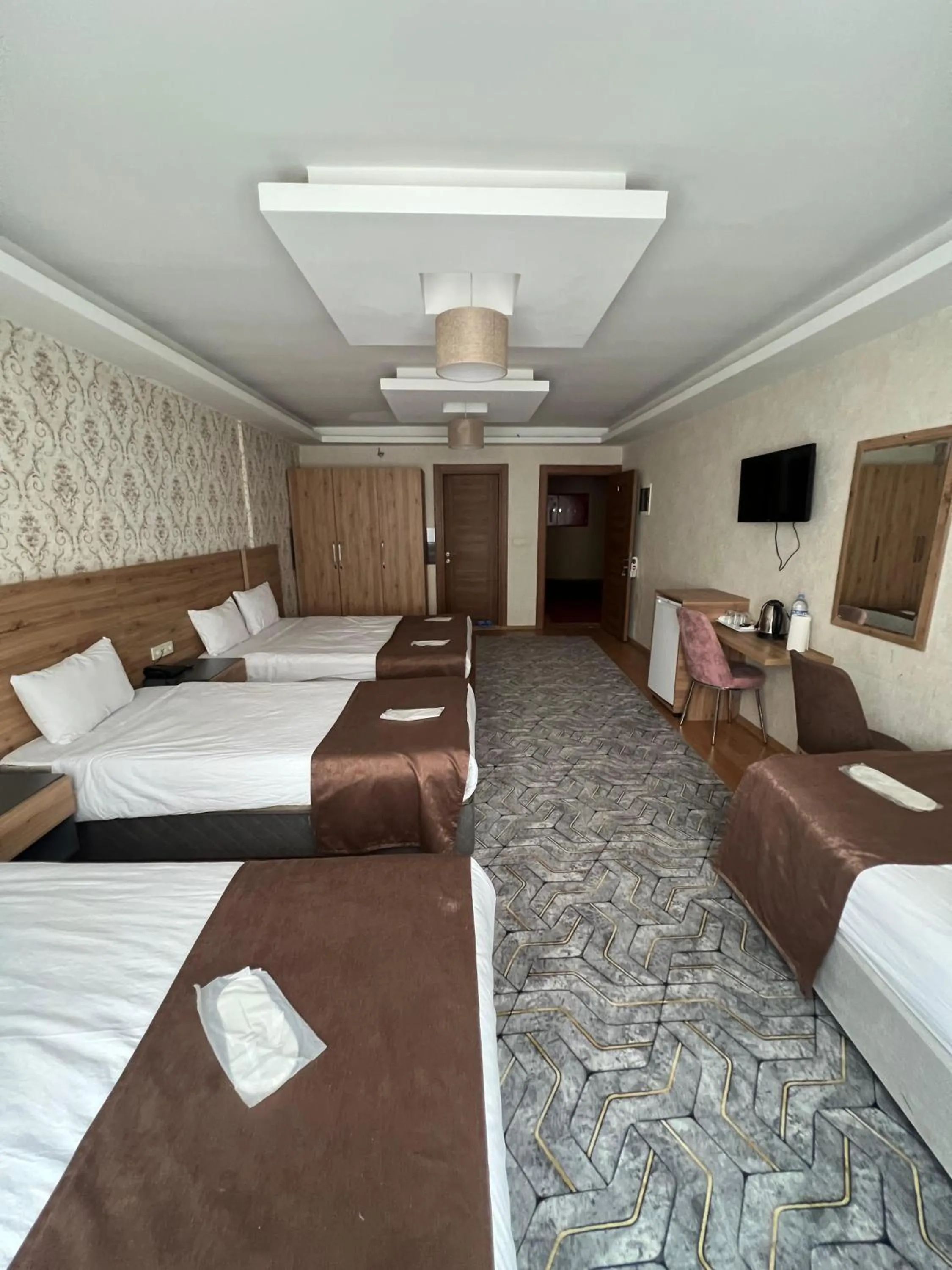 Bed in inDİANA HOTEL