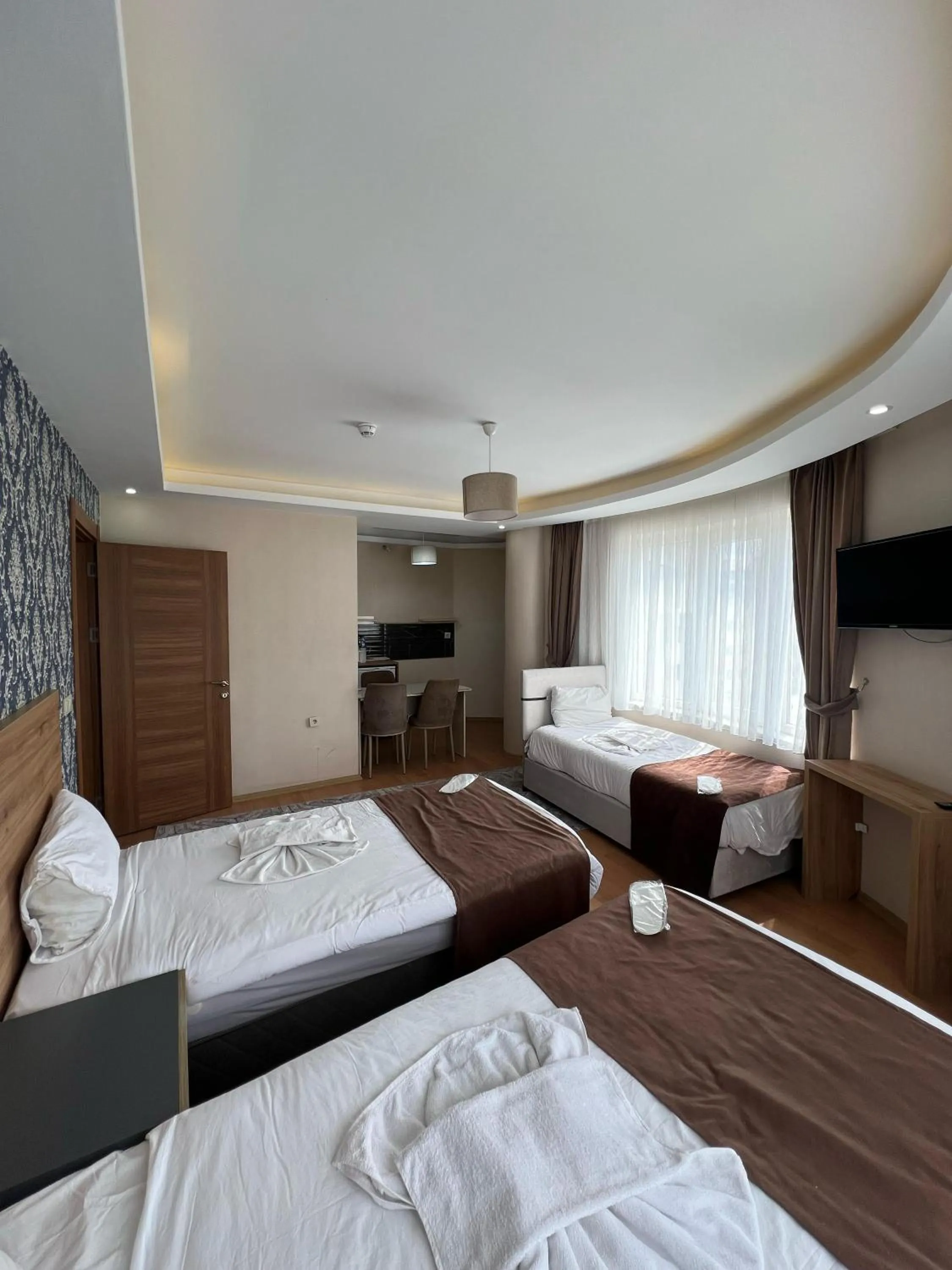 Bed in inDİANA HOTEL