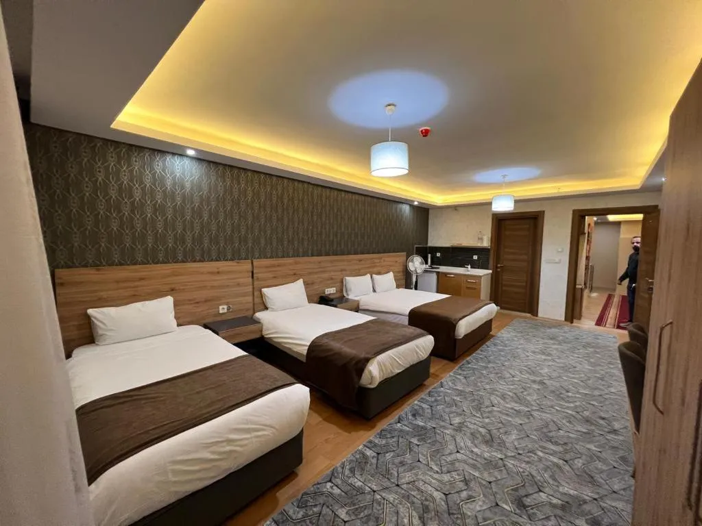Bed in inDİANA HOTEL