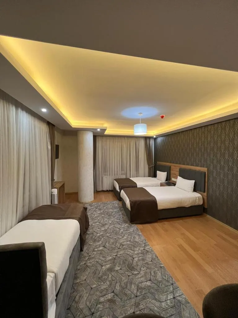 Bed in inDİANA HOTEL