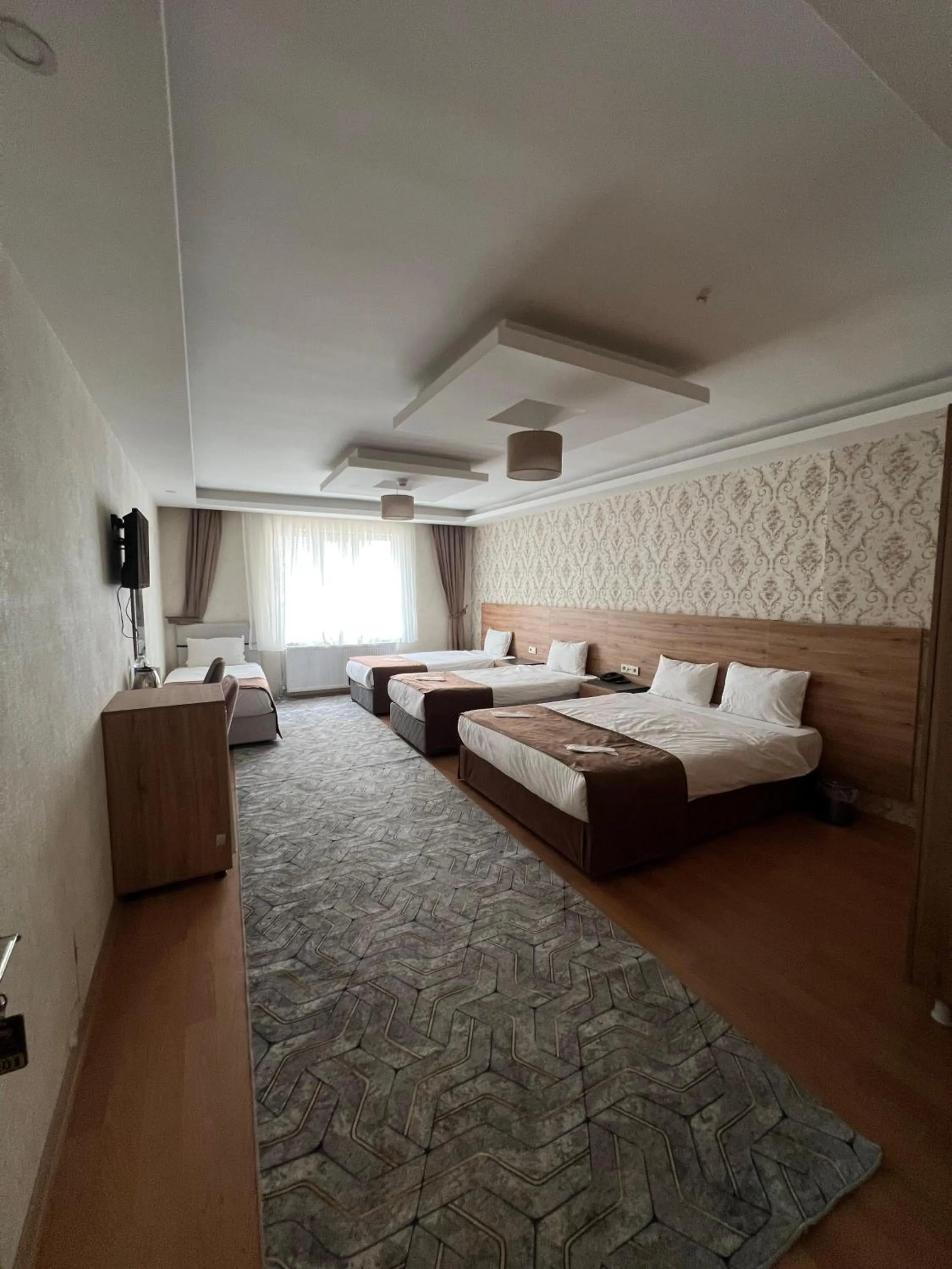 Bed in inDİANA HOTEL