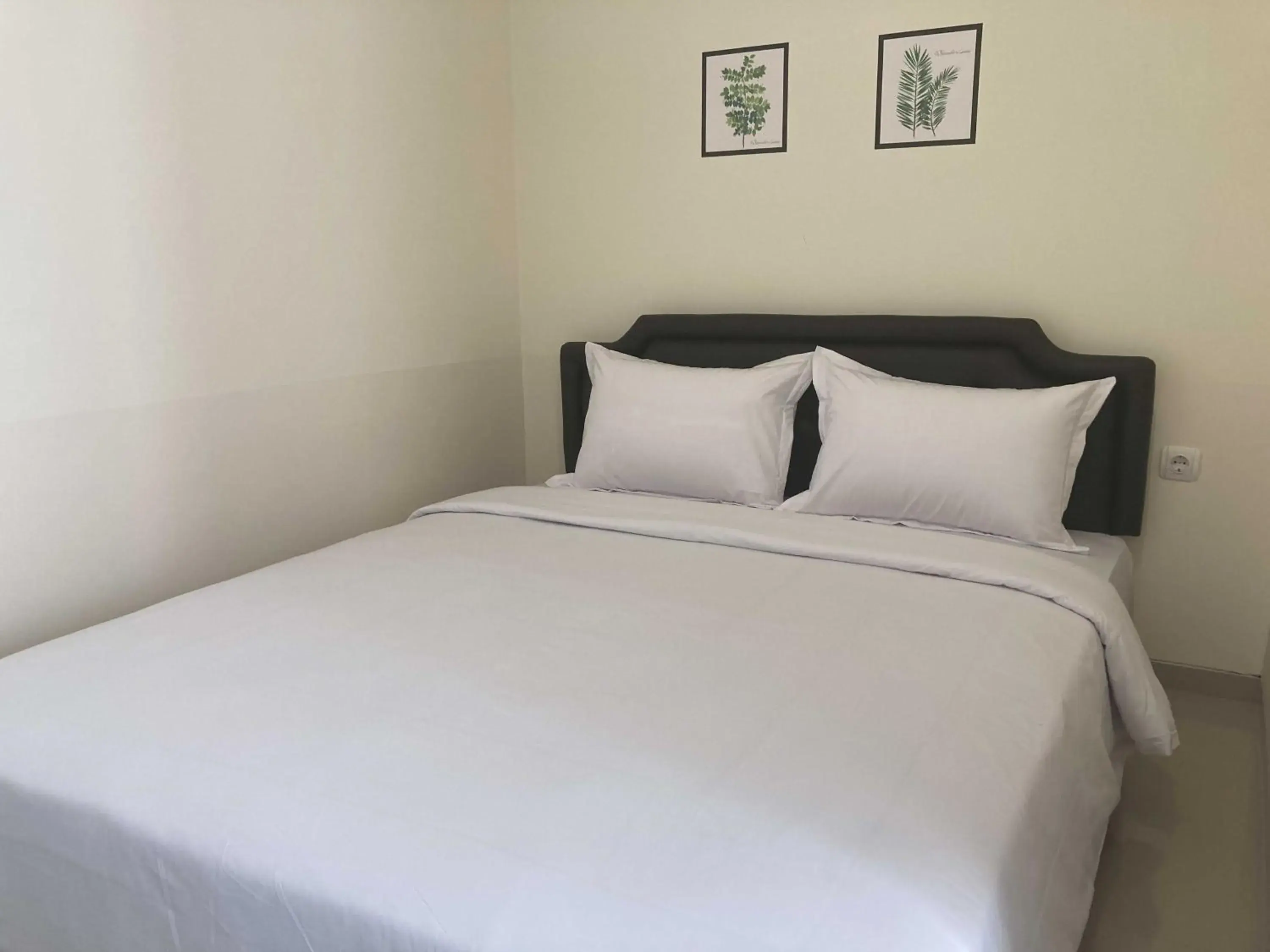 Bed in Hartono Inn Seturan Mitra RedDoorz Bed in Hartono Inn Seturan Mitra RedDoorz