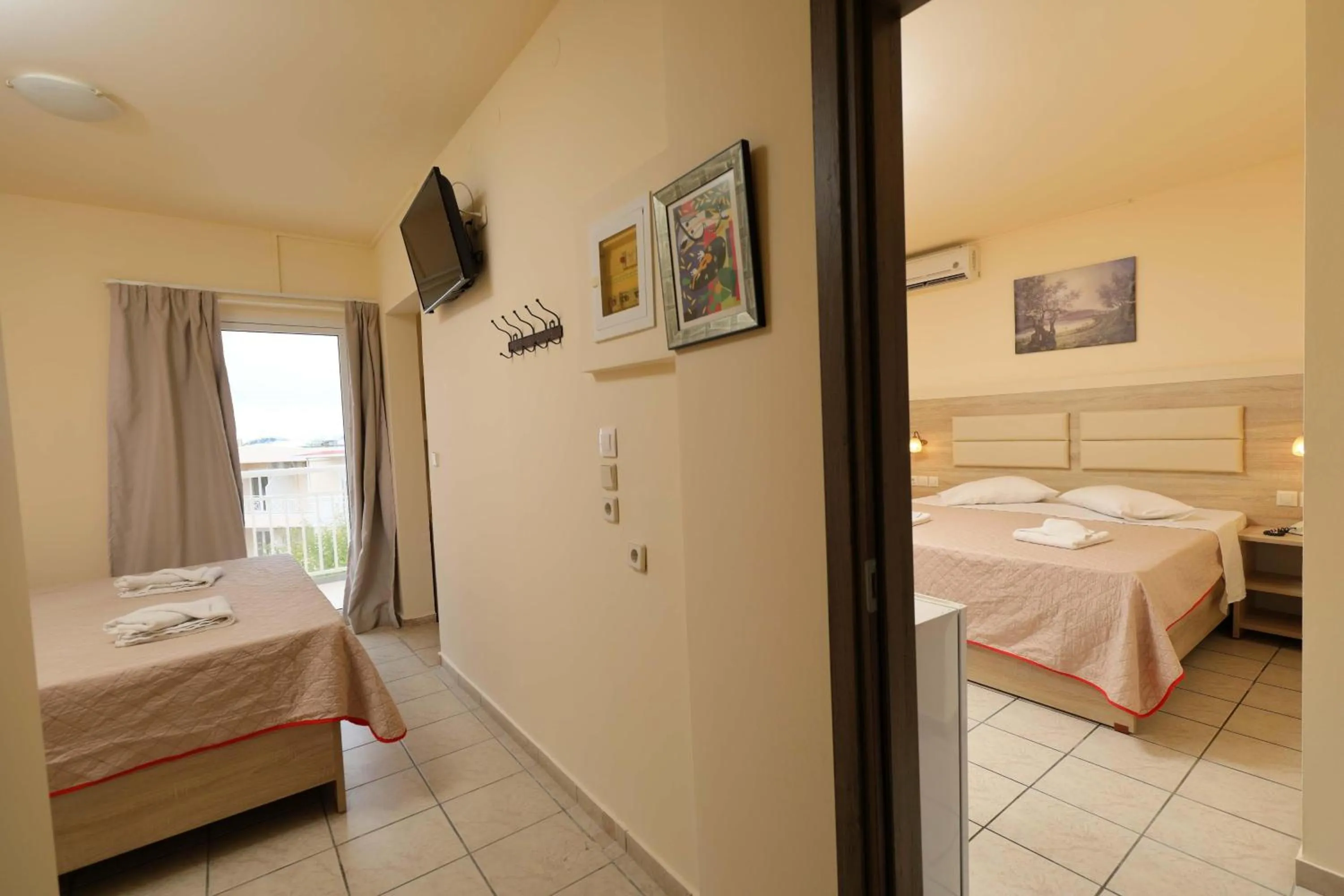 Photo of the whole room, Bed in SunBay Hotel