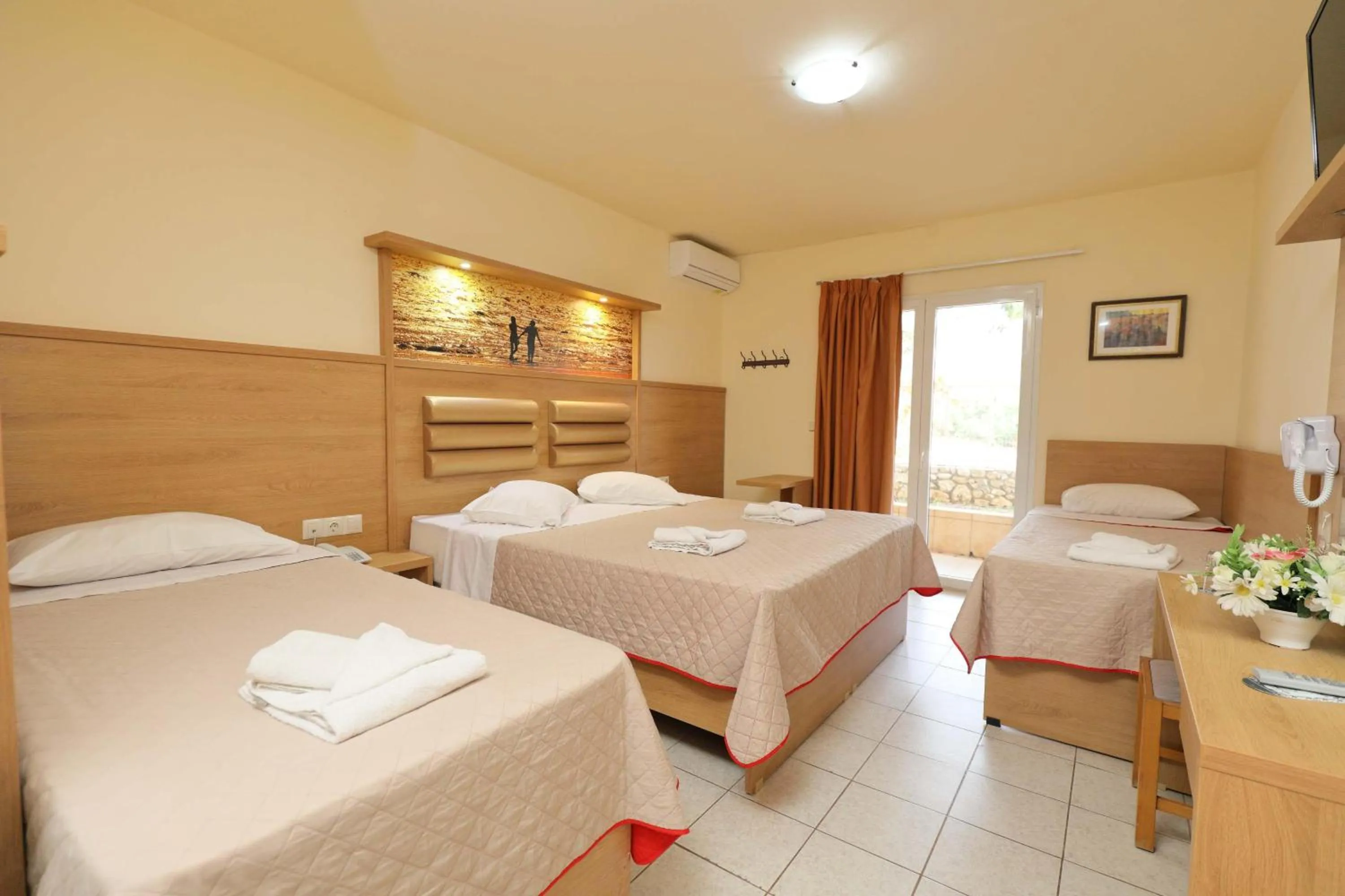 Photo of the whole room, Bed in SunBay Hotel