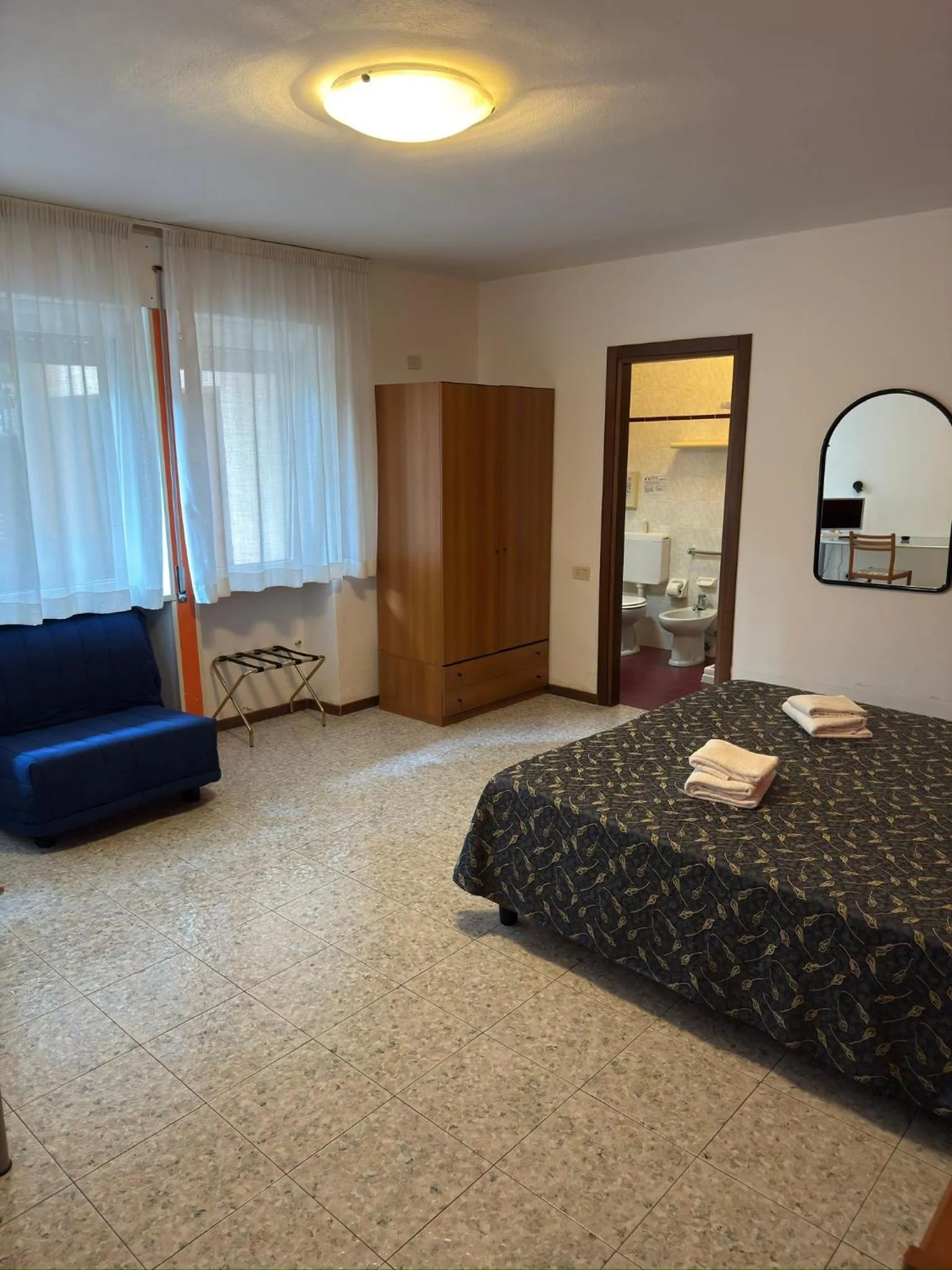 Bed in Hotel Benacus