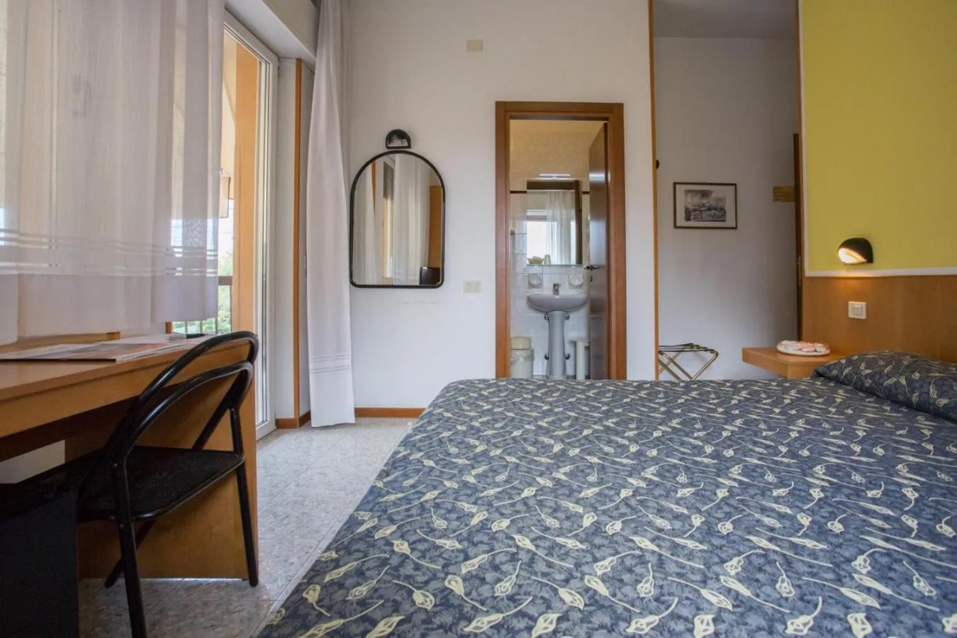 Bed in Hotel Benacus