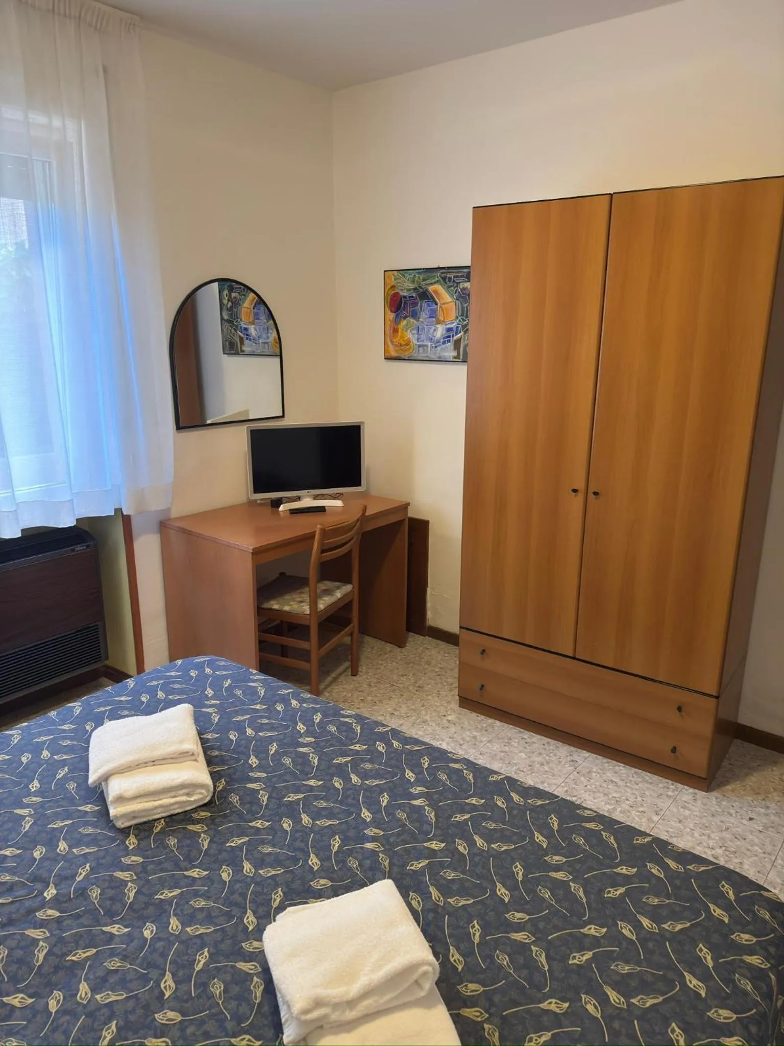 Bed in Hotel Benacus
