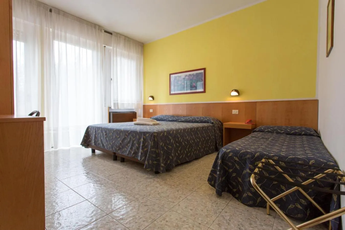 Bed in Hotel Benacus