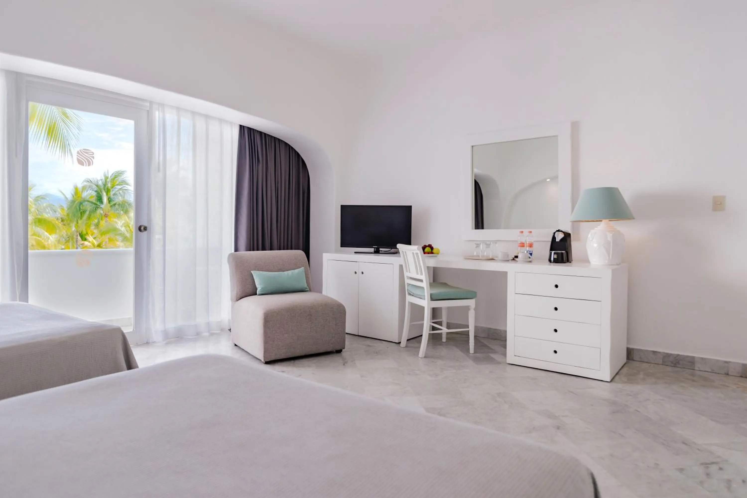 Seating area, Bed in Las Hadas by Brisas