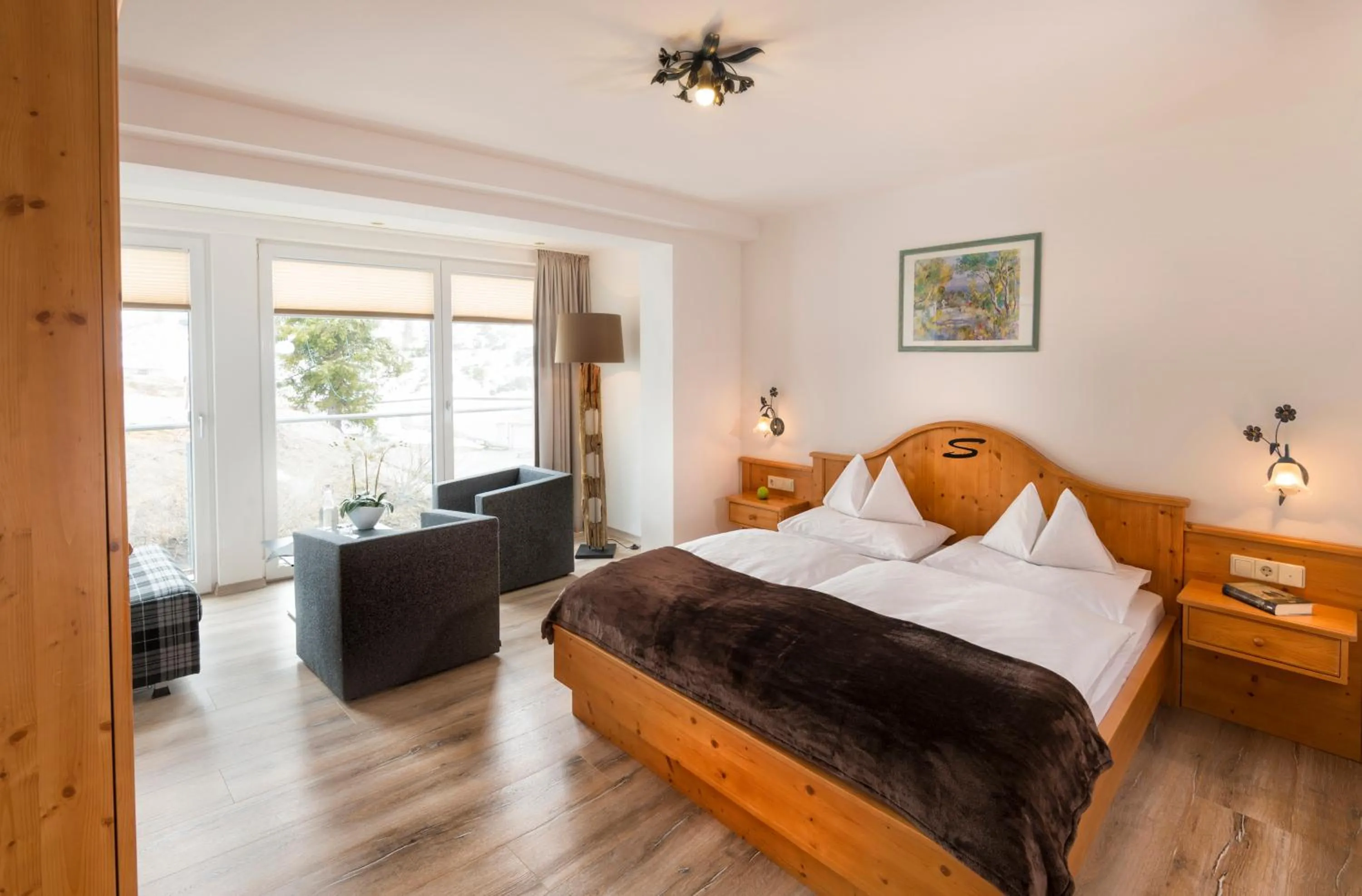 Photo of the whole room, Bed in Sporthotel Snowwhite