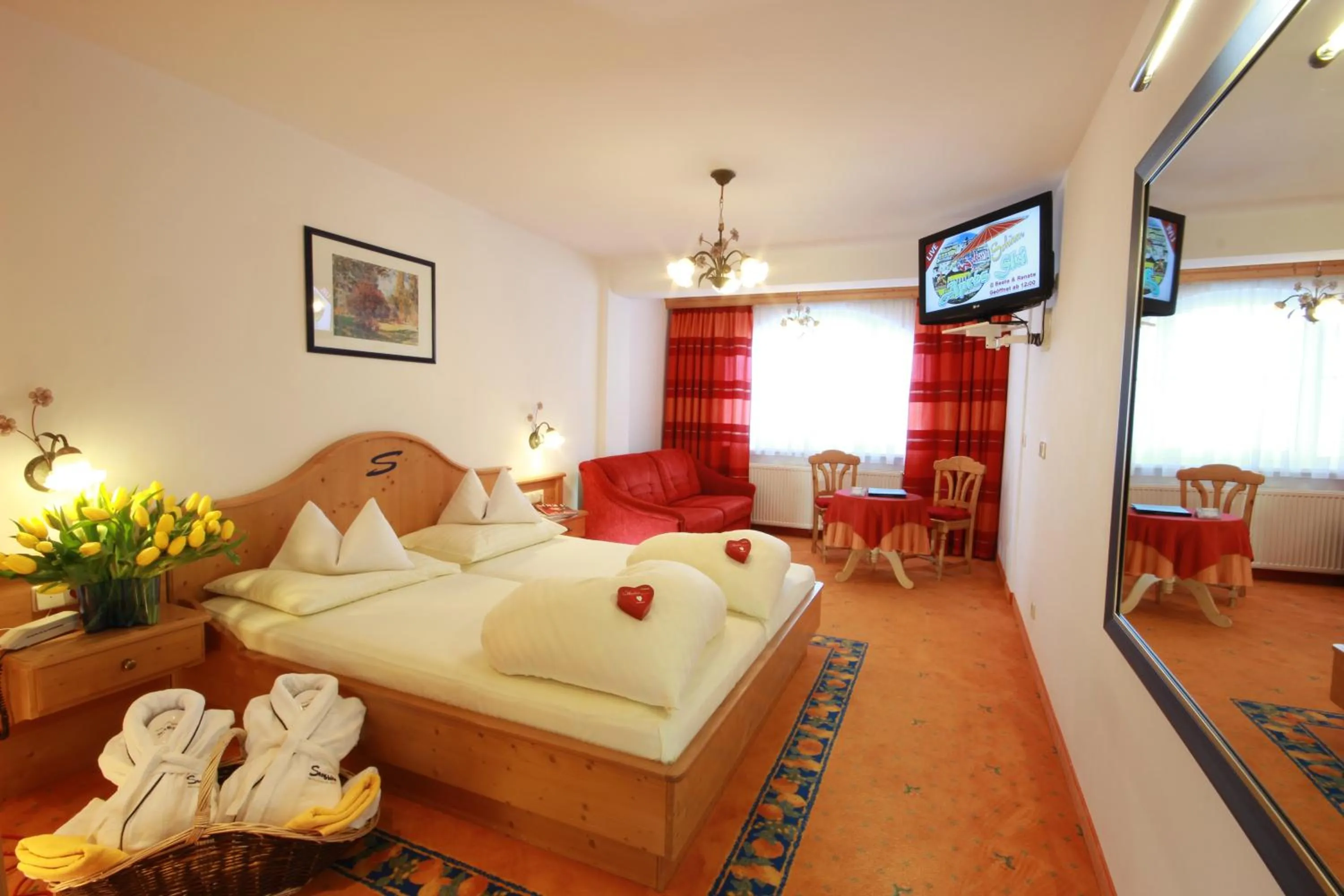 Photo of the whole room, Bed in Sporthotel Snowwhite