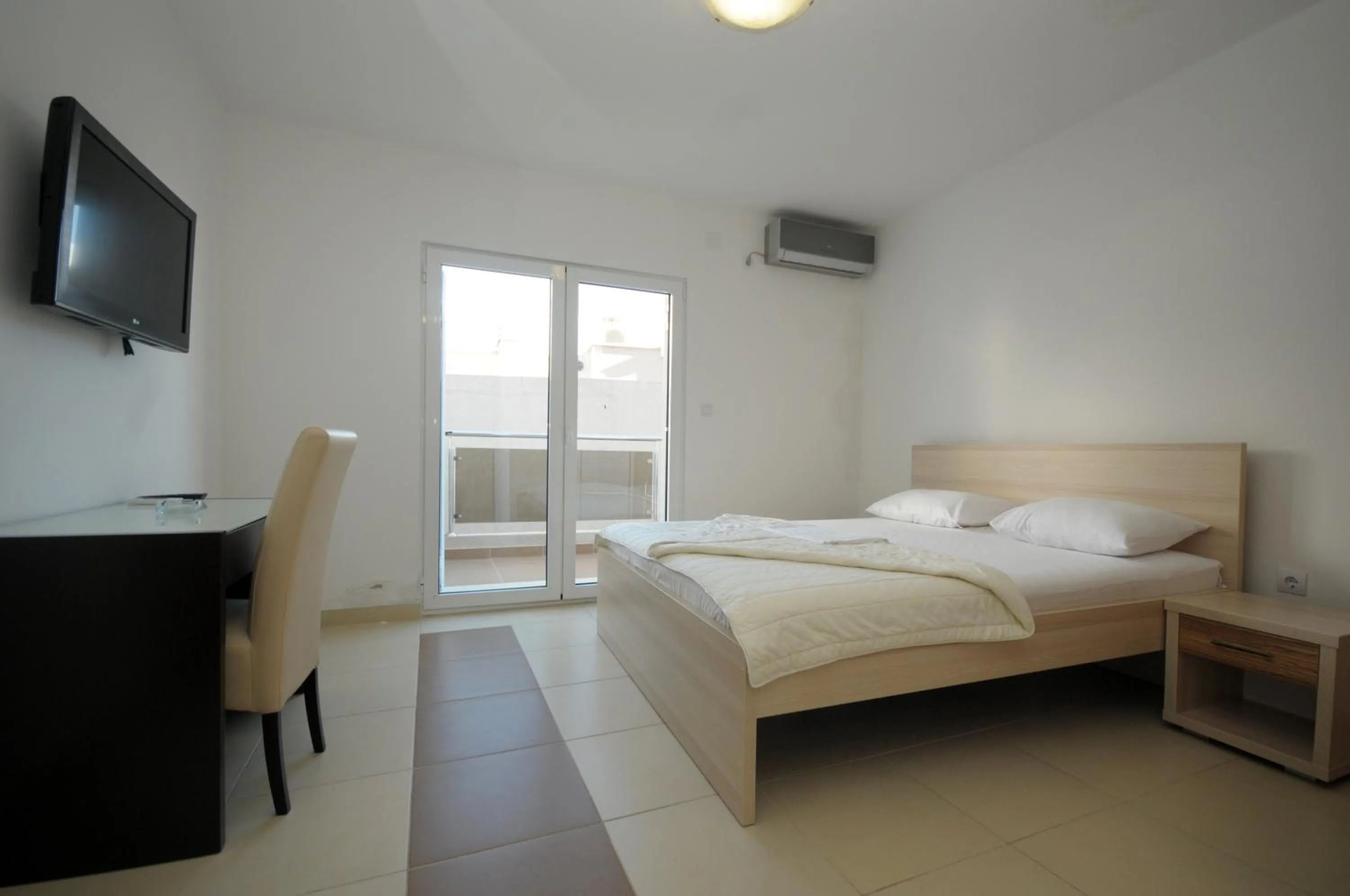 Bed in Apartments Anita