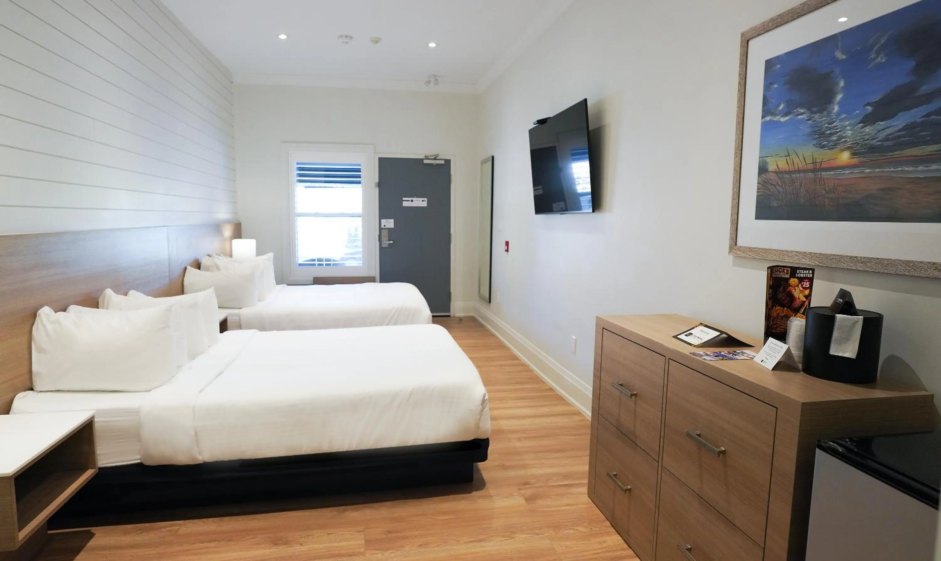 Bed in Colonial Hotel & Suites