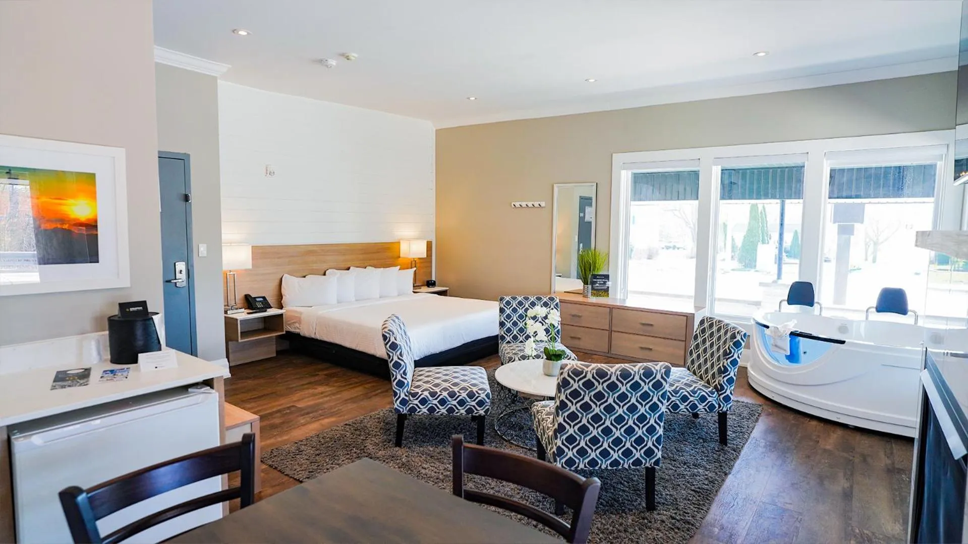 Bed in Colonial Hotel & Suites