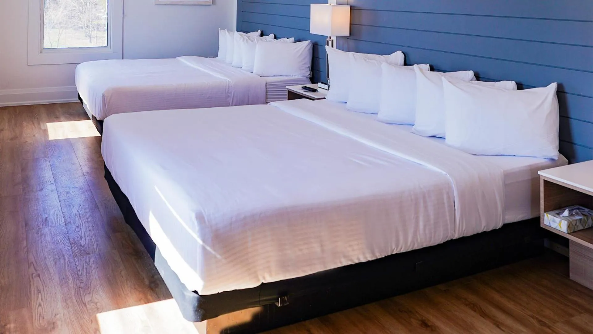 Bed in Colonial Hotel & Suites