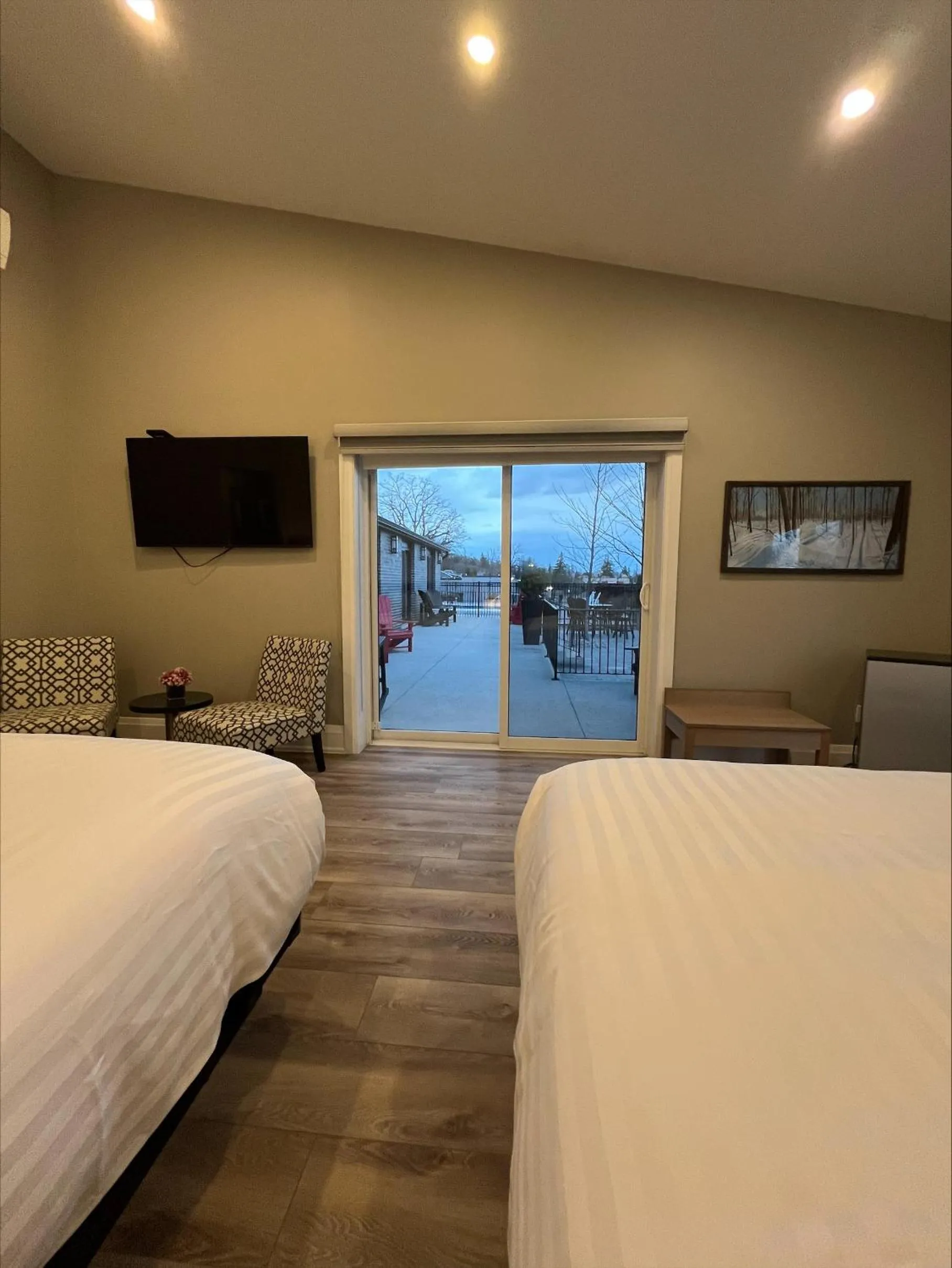 Bed in Colonial Hotel & Suites