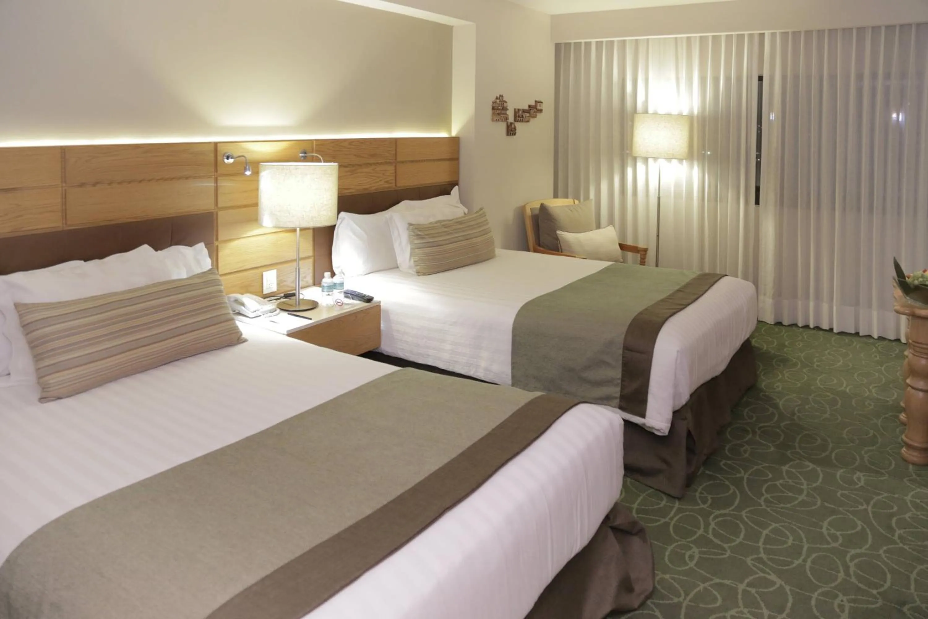 Photo of the whole room, Bed in Marriott Tuxtla Gutierrez Hotel