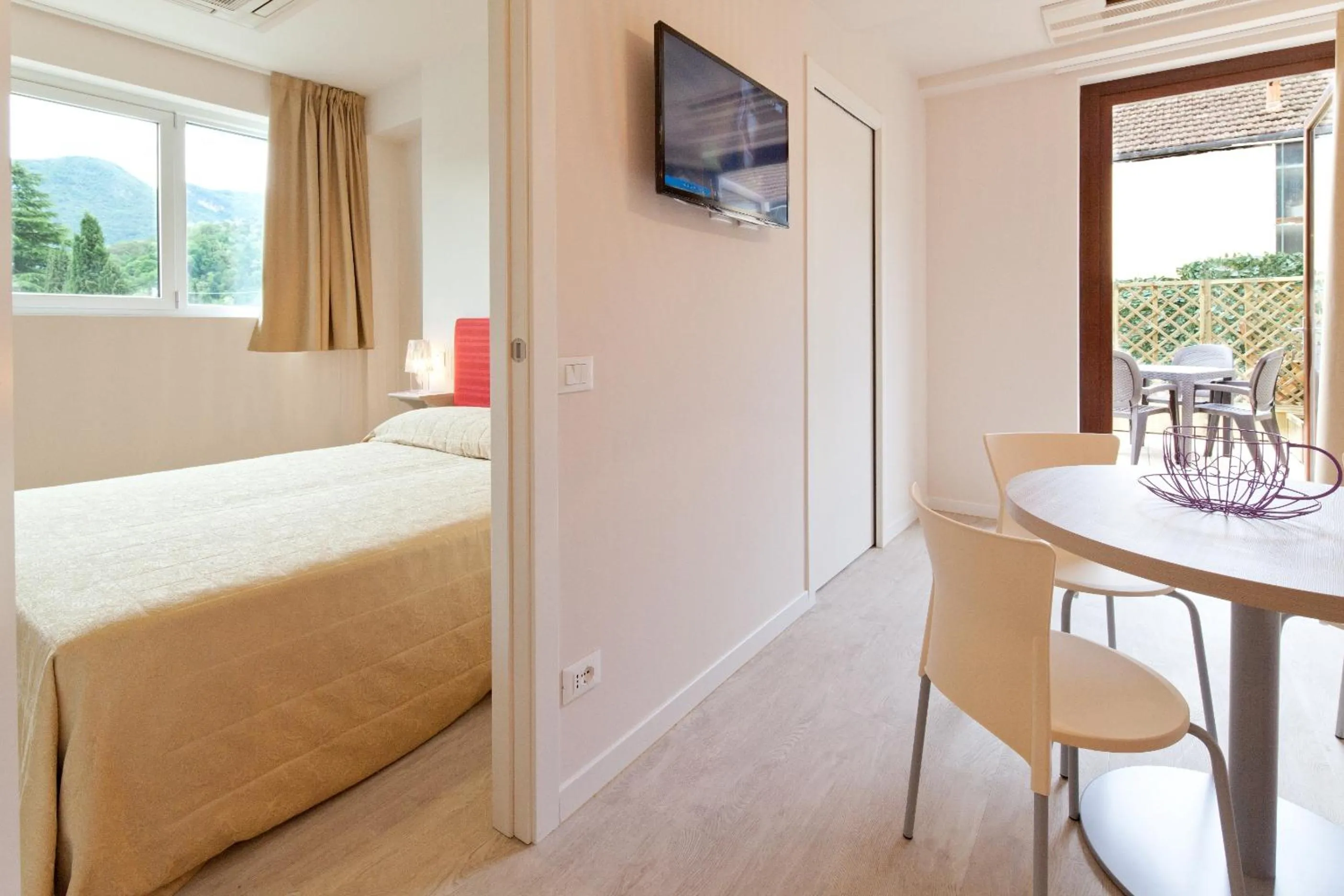 Living room, Bed in Residence Lenno