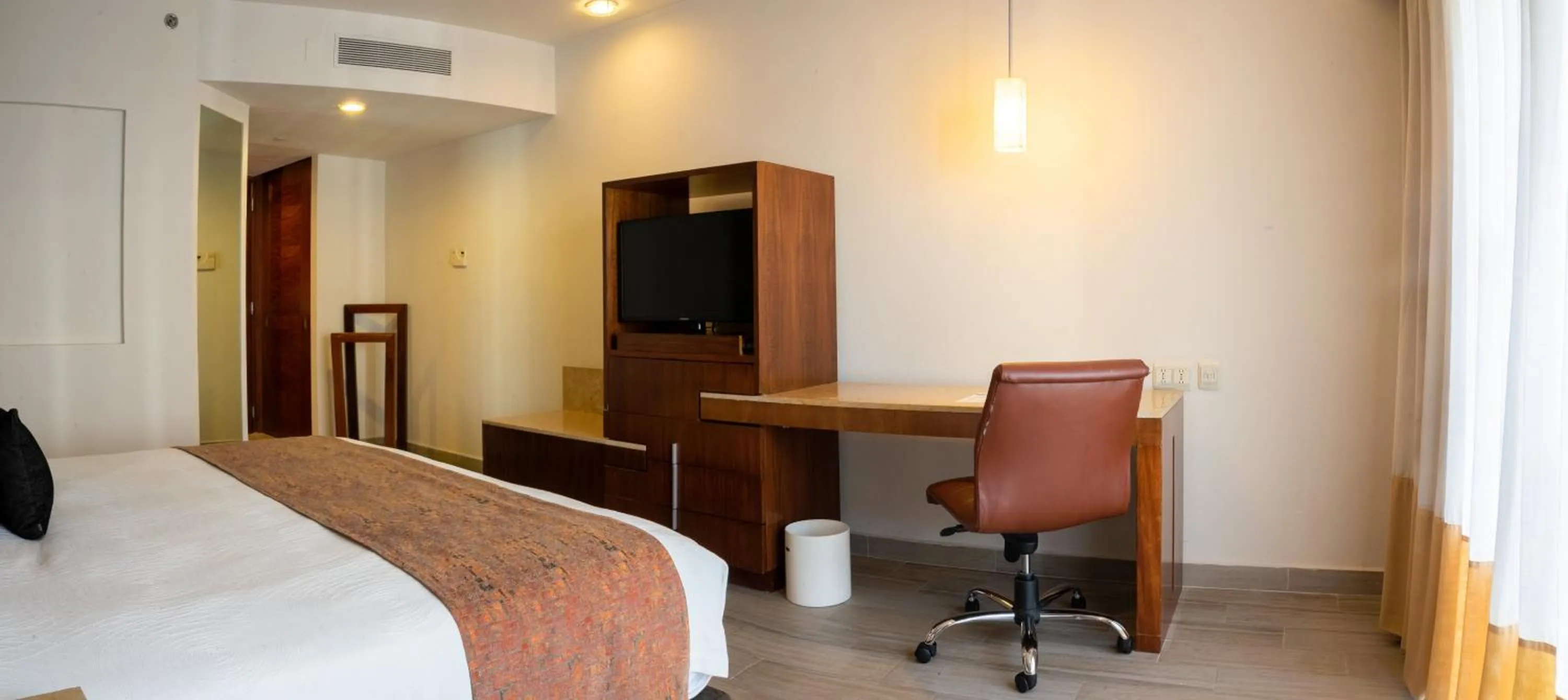 Bedroom in Real Inn Guadalajara Expo