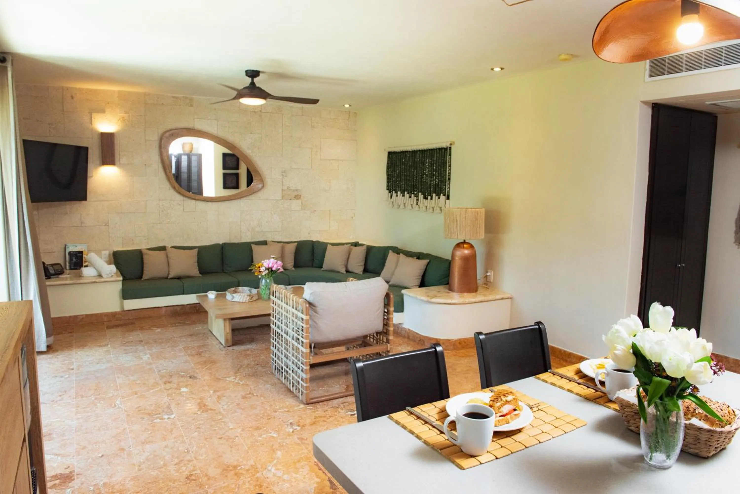 Living room in El Taj Oceanfront and Beachside Condo Hotel