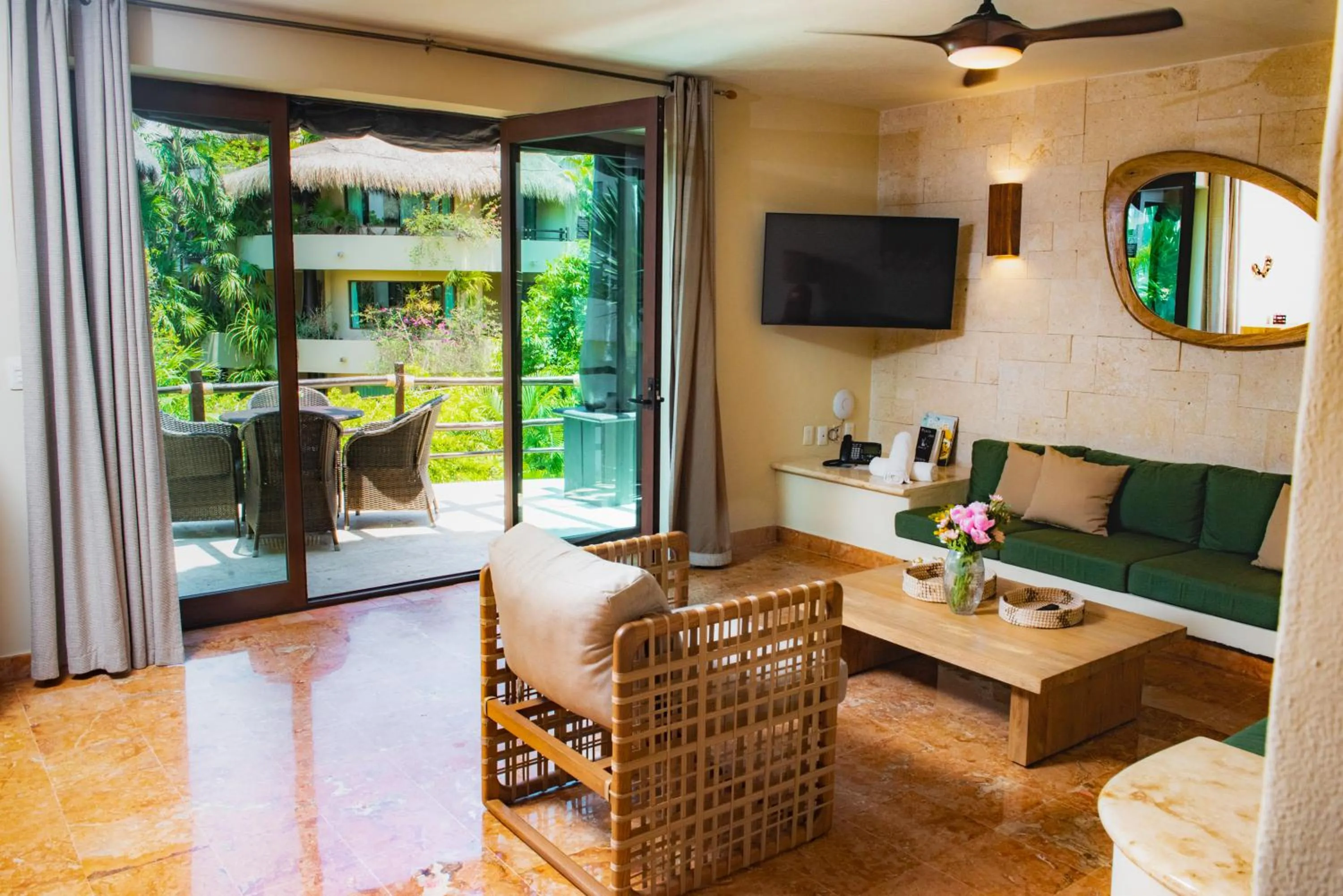 Living room in El Taj Oceanfront and Beachside Condo Hotel