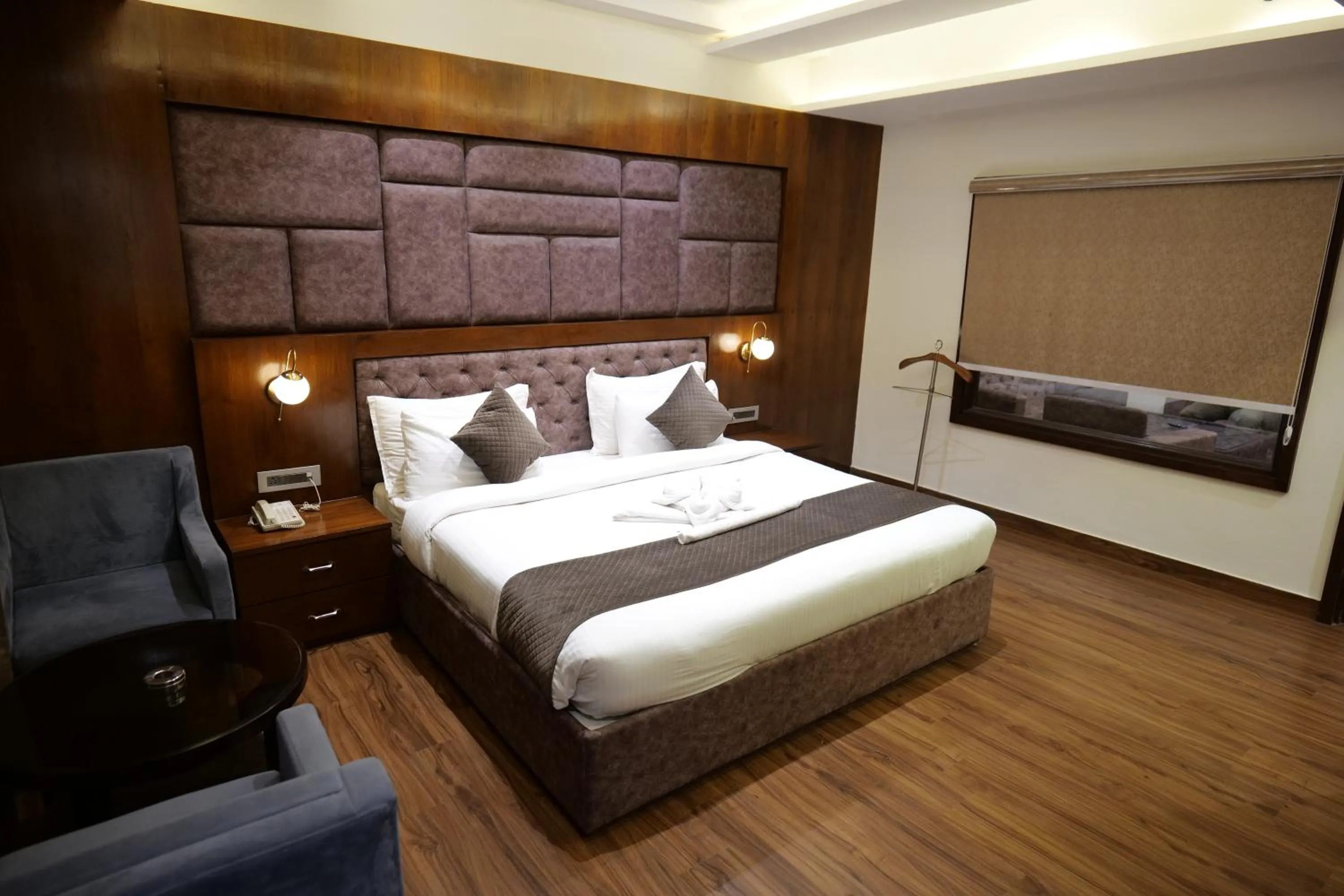 Photo of the whole room, Bed in The Emerald Grand