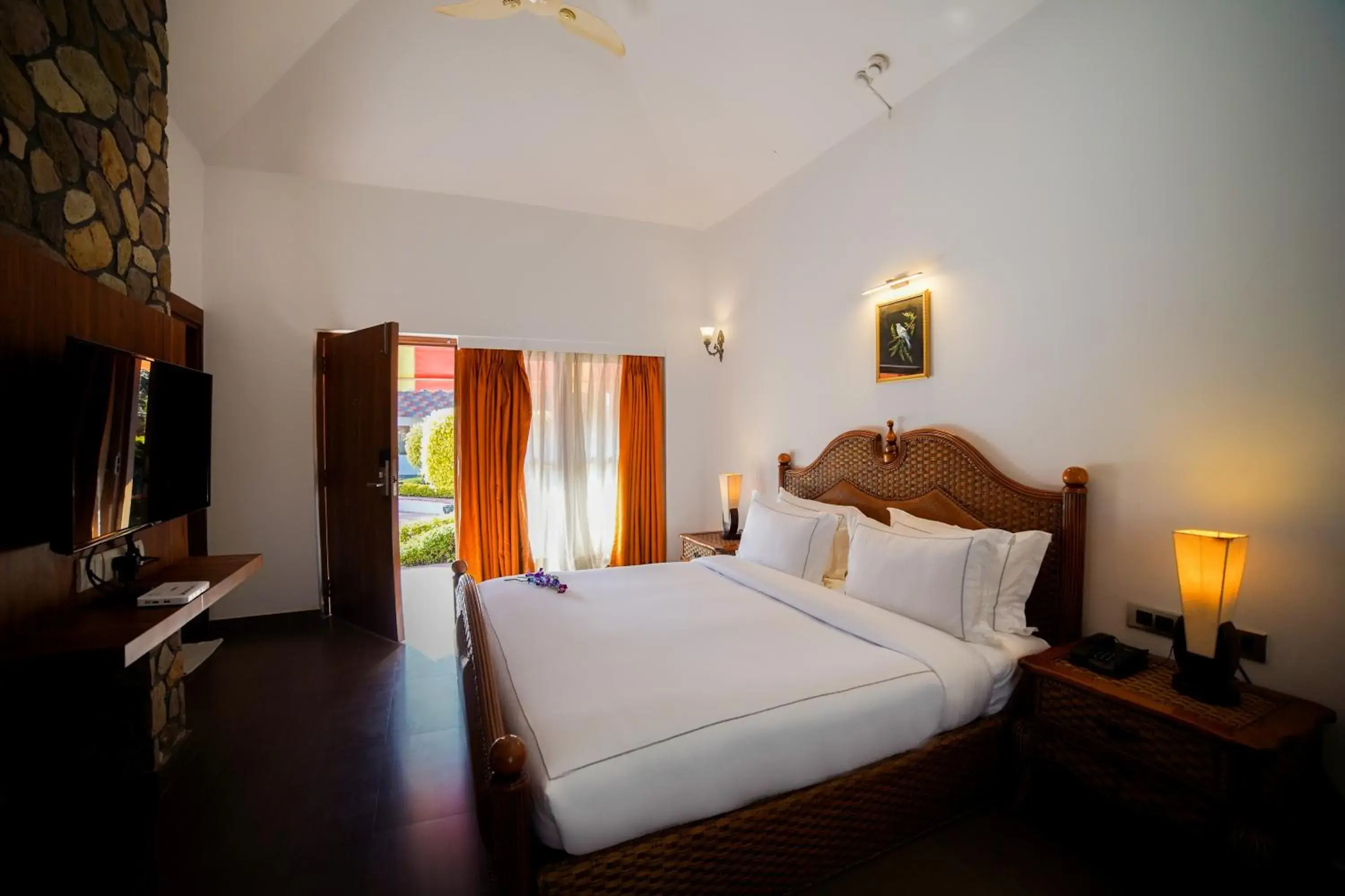 Photo of the whole room, Bed in Country Inn Tarika Riverside Resort Jim Corbett Photo of the whole room, Bed in Country Inn Tarika Riverside Resort Jim Corbett