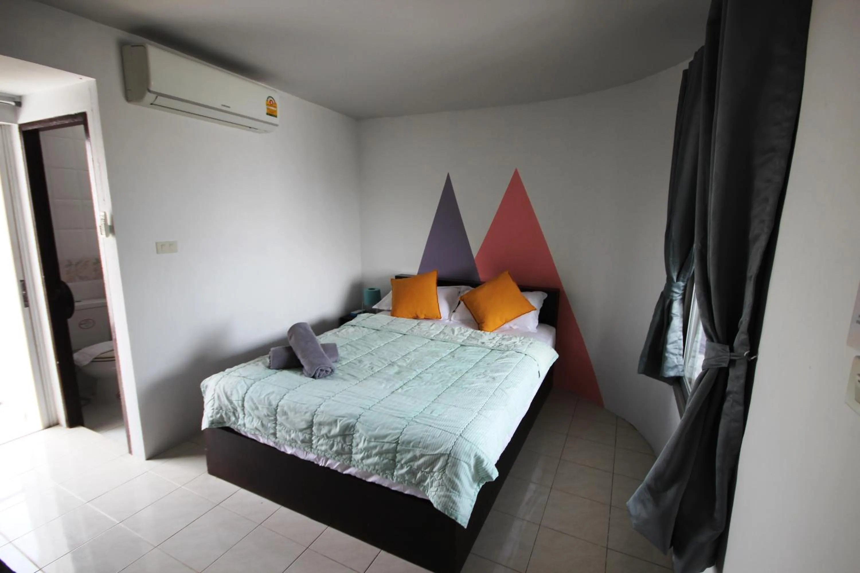 Bed in Hua Hin Paradise Guesthouse