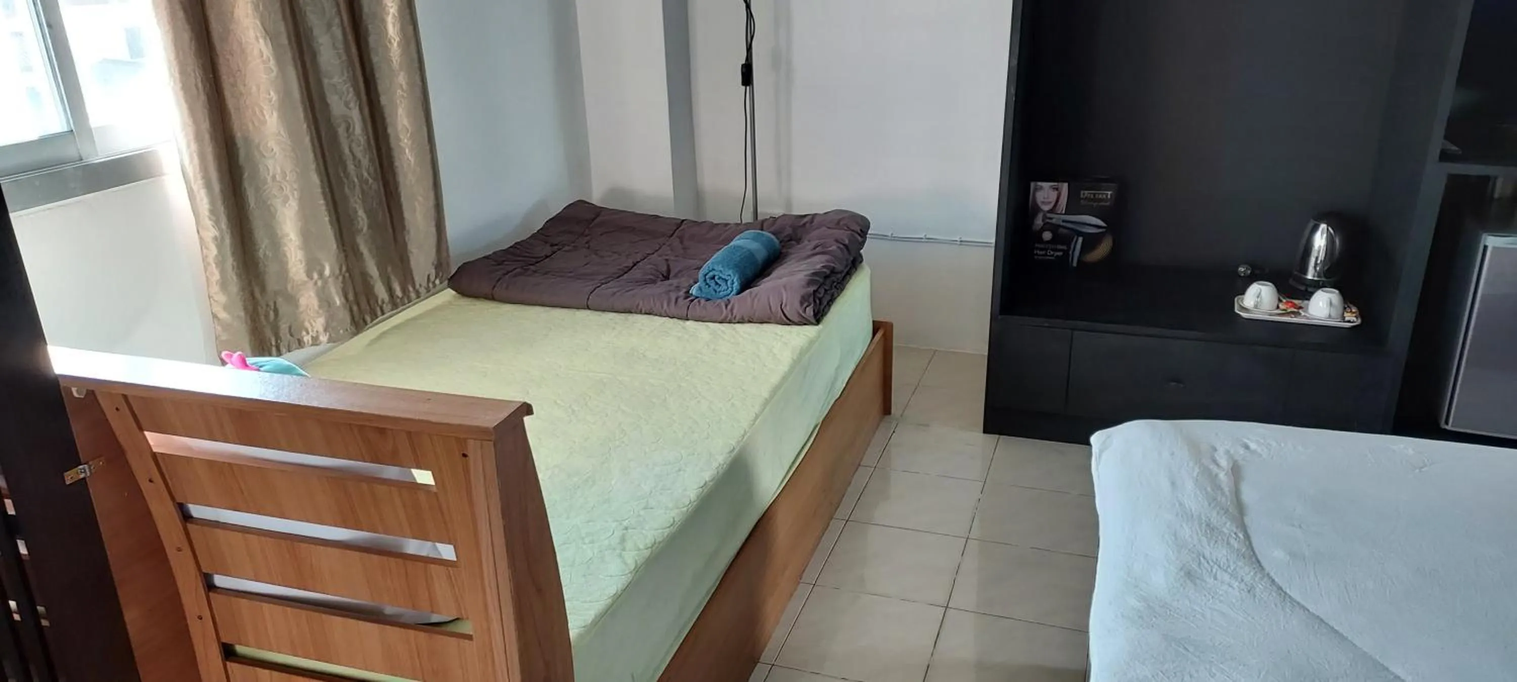 Bed in Hua Hin Paradise Guesthouse