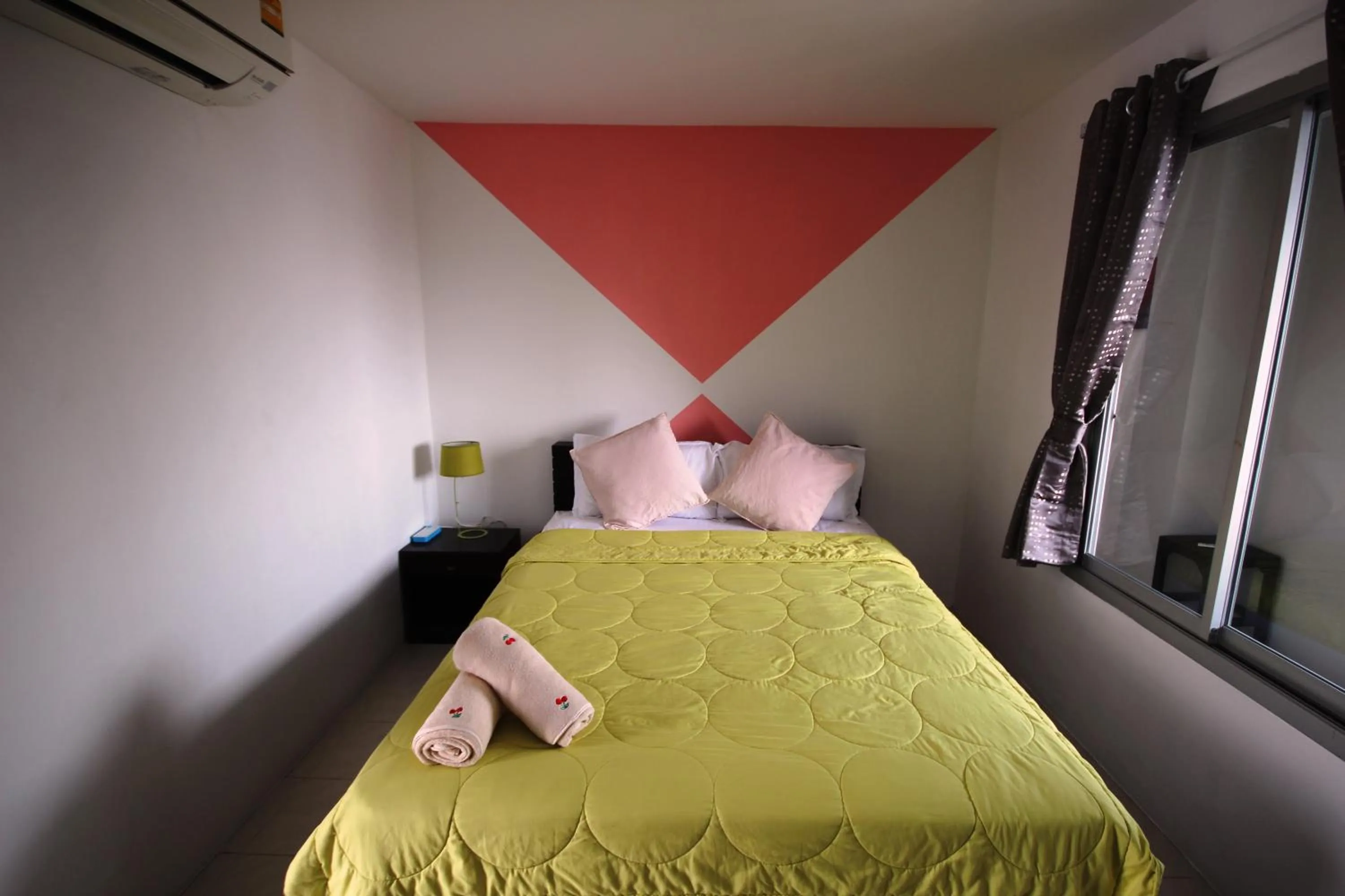 Bed in Hua Hin Paradise Guesthouse