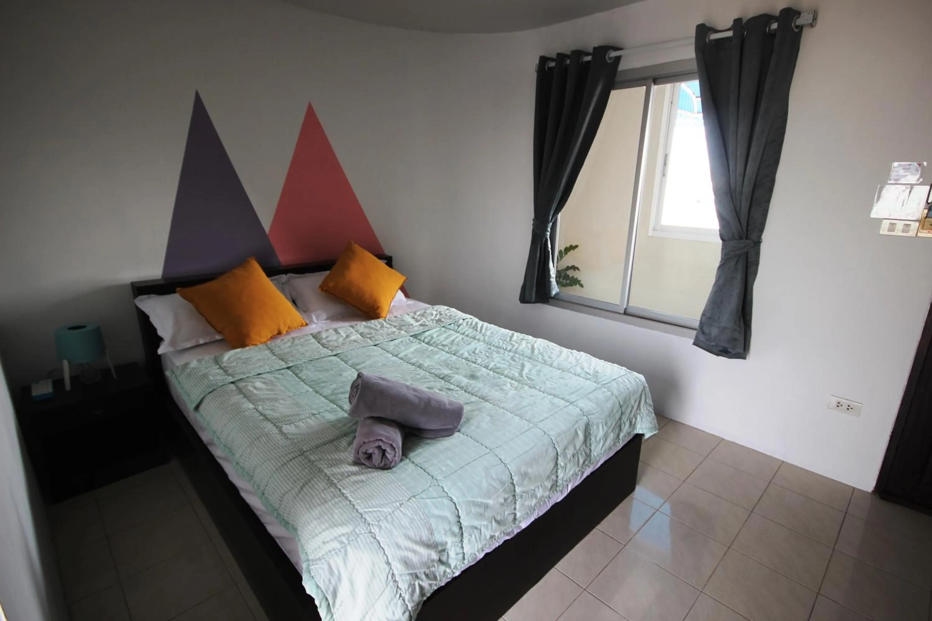 Bed in Hua Hin Paradise Guesthouse