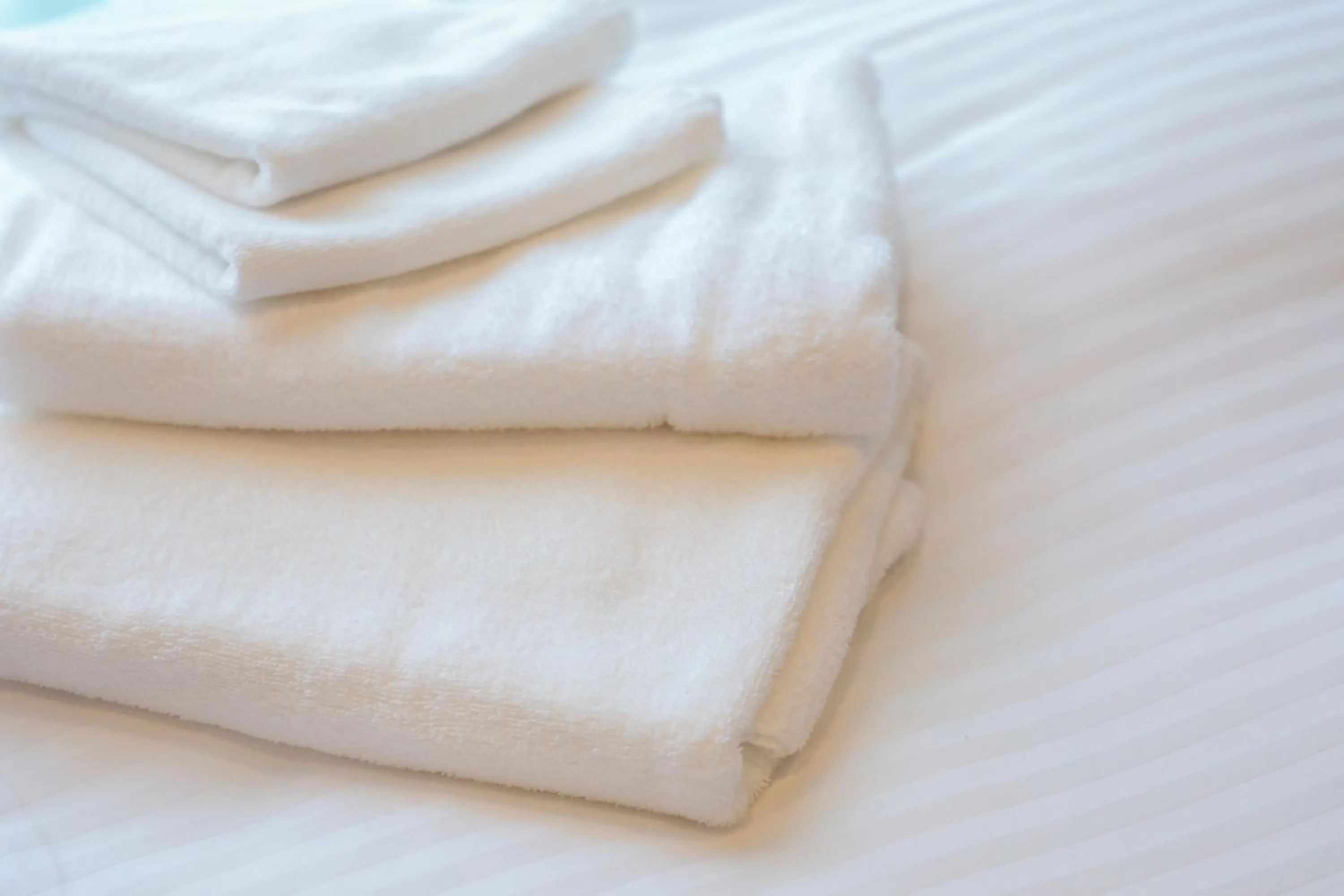 towels, Bed in HOTEL SO SUMIYOSHi ホテルソウ博多住吉