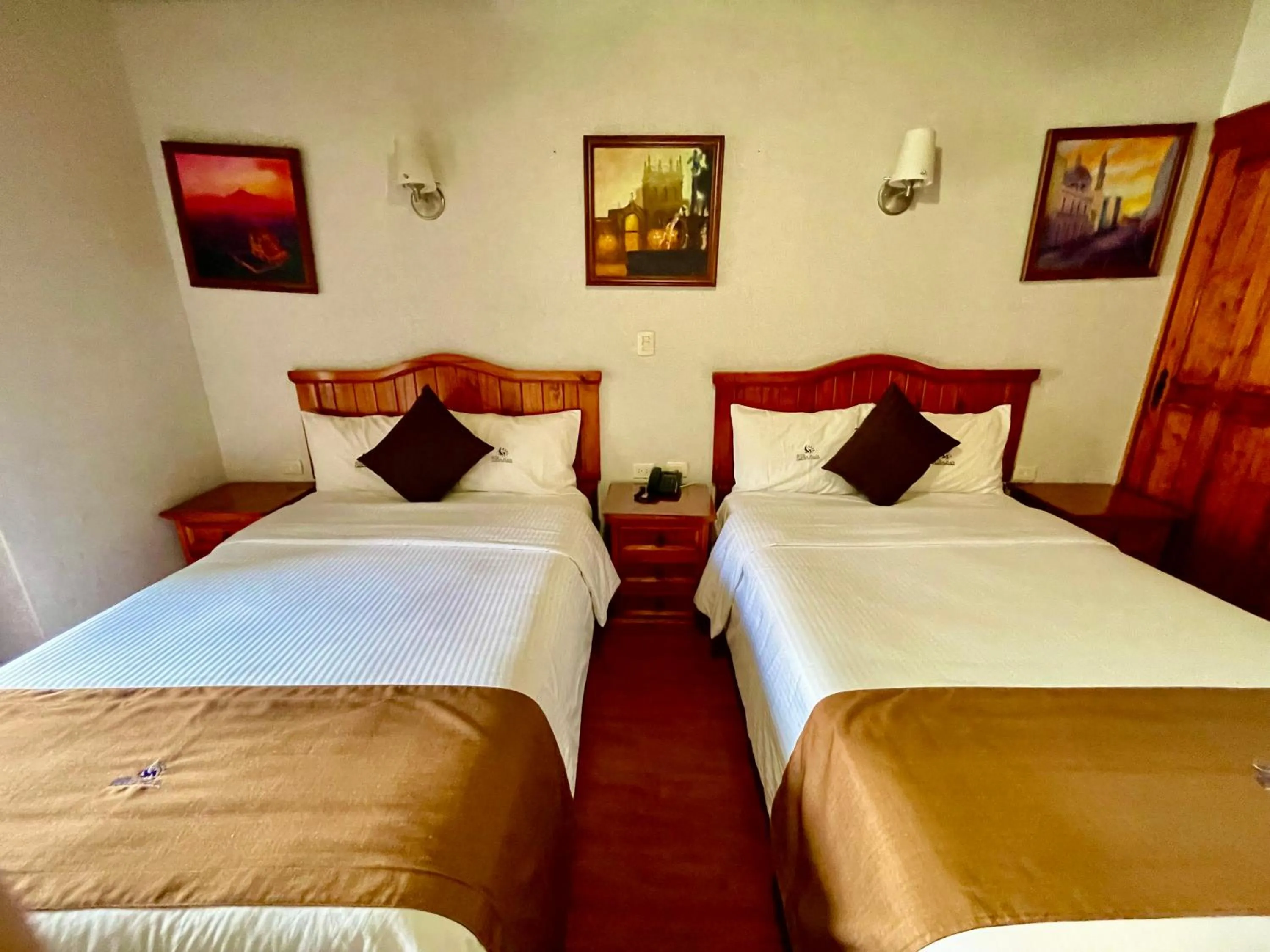 Bed in Hotel Puebla Plaza