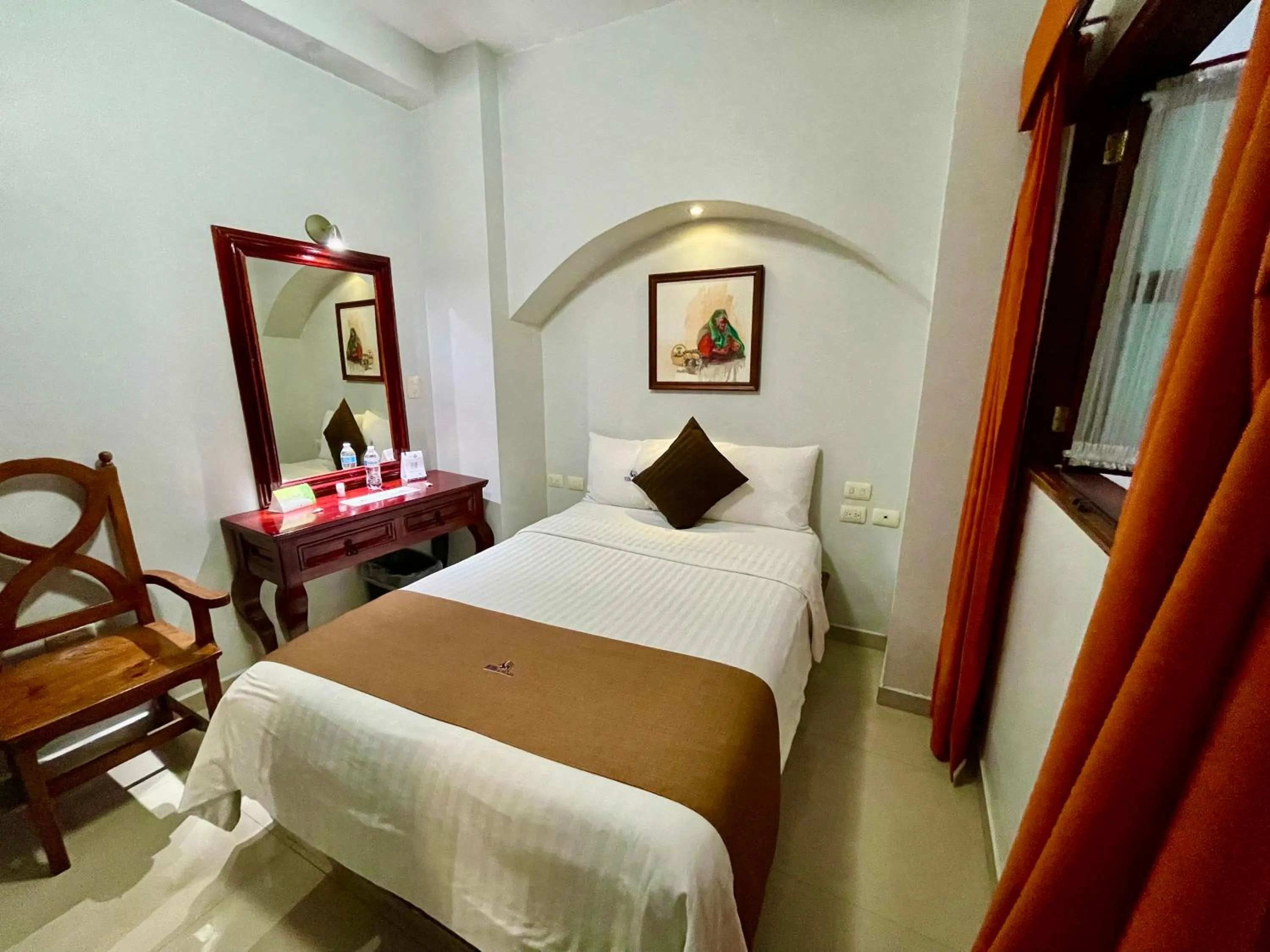 Bed in Hotel Puebla Plaza