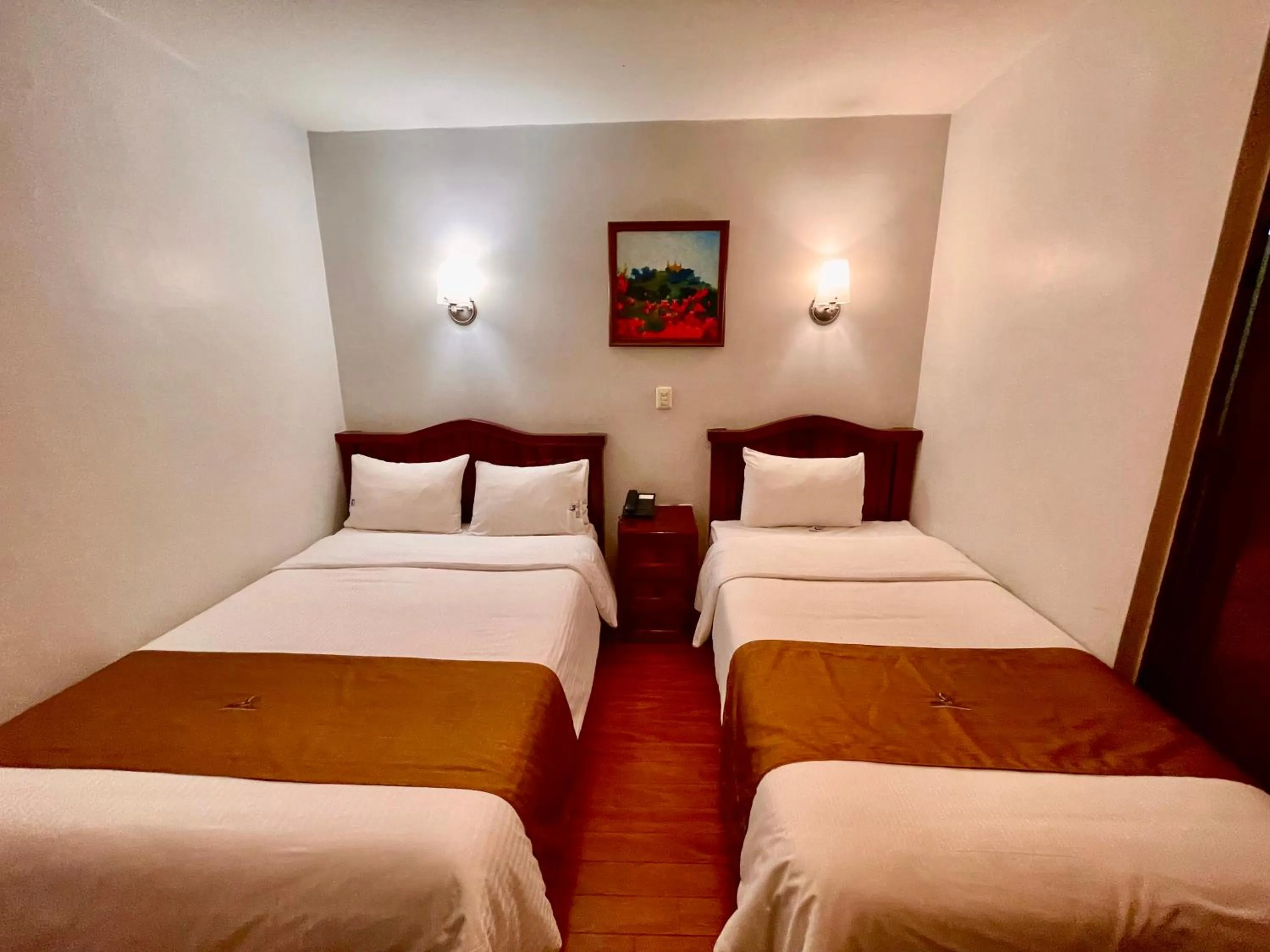 Bed in Hotel Puebla Plaza