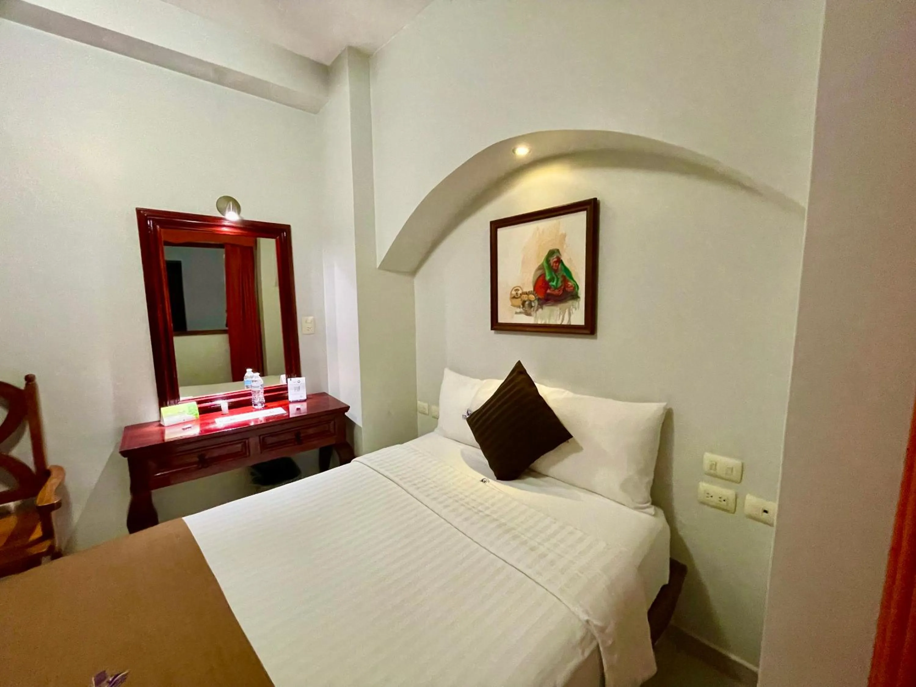 Bed in Hotel Puebla Plaza