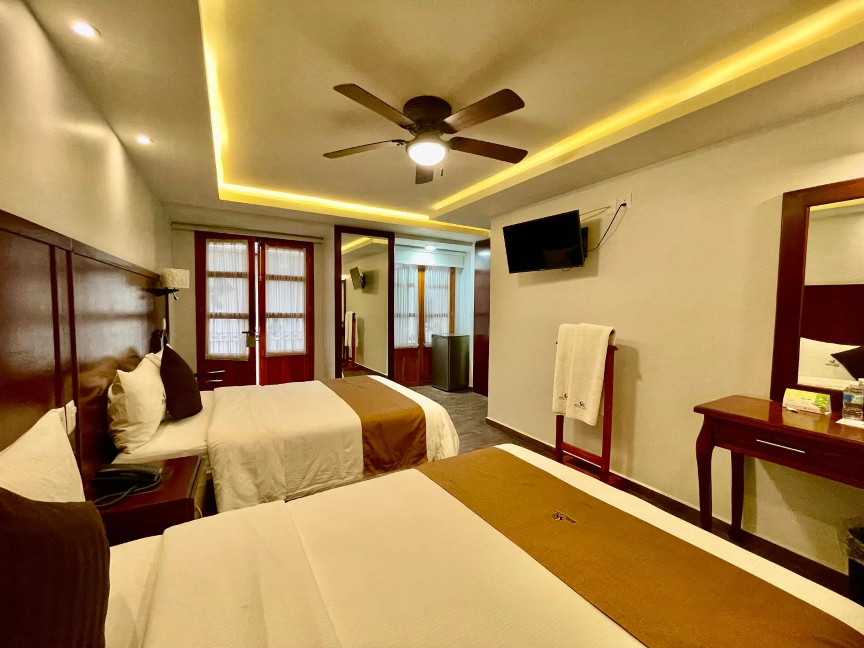 Bed in Hotel Puebla Plaza