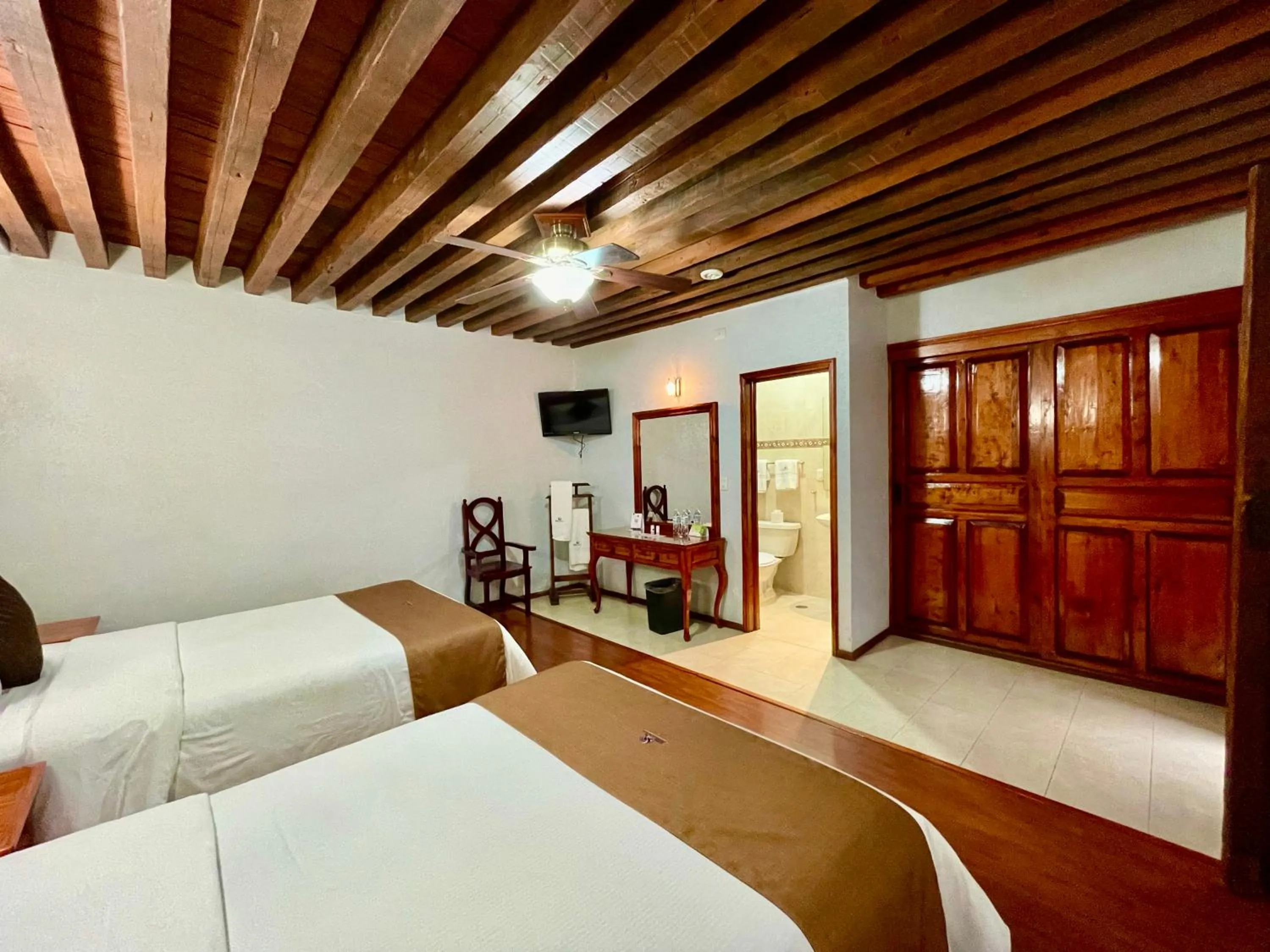 Bed in Hotel Puebla Plaza