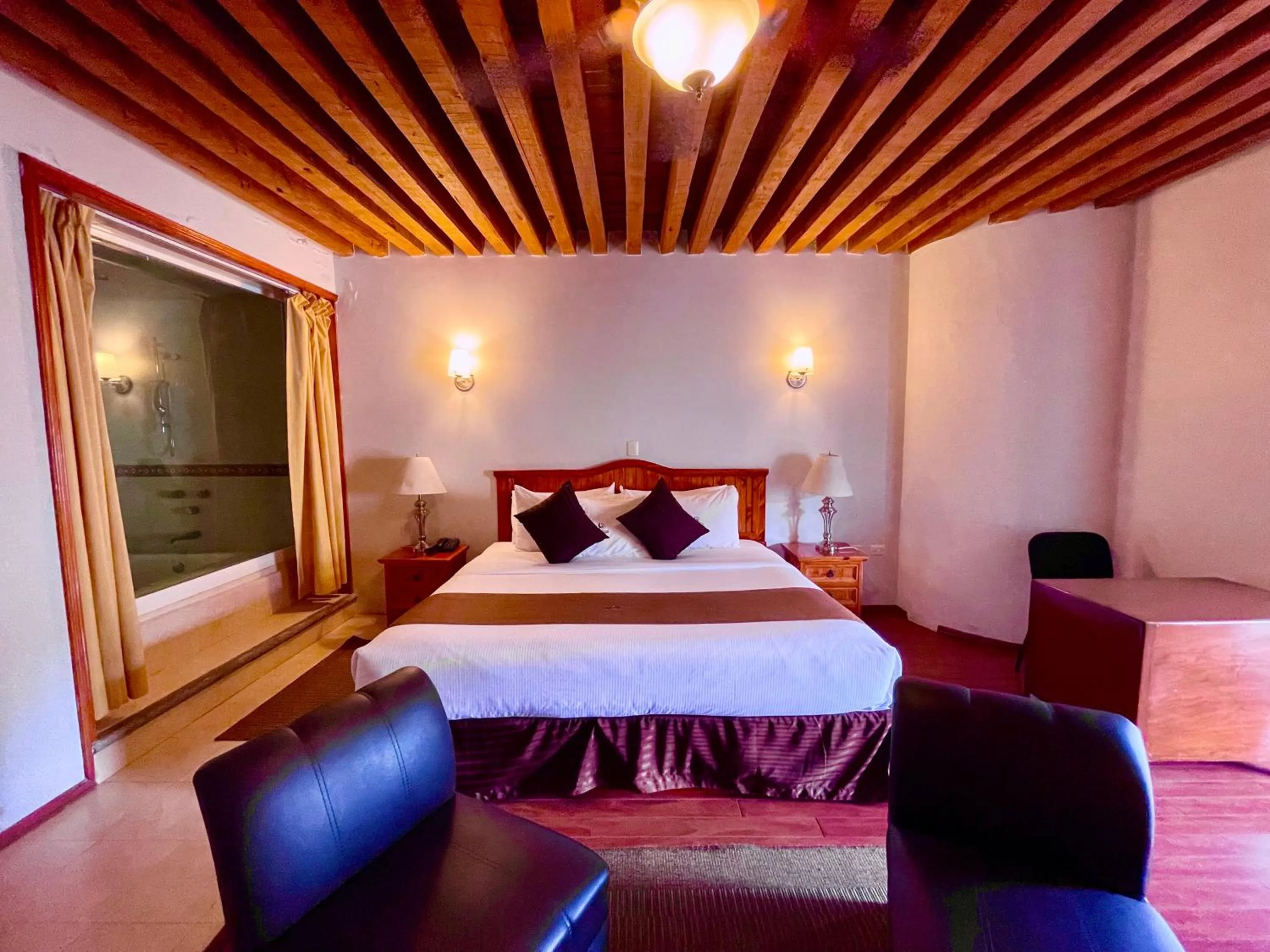 Bed in Hotel Puebla Plaza