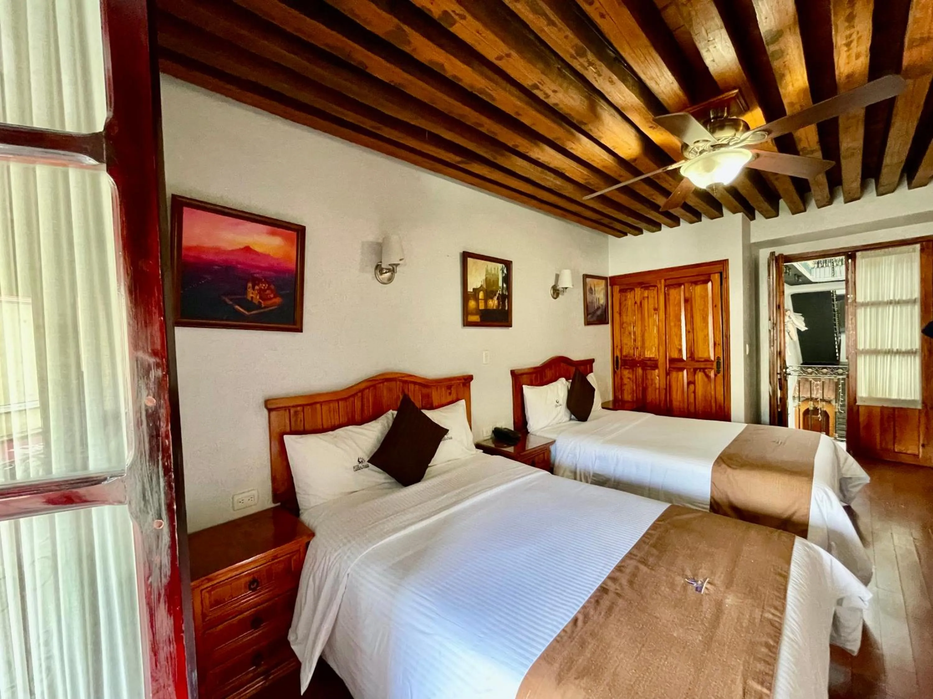 Bed in Hotel Puebla Plaza