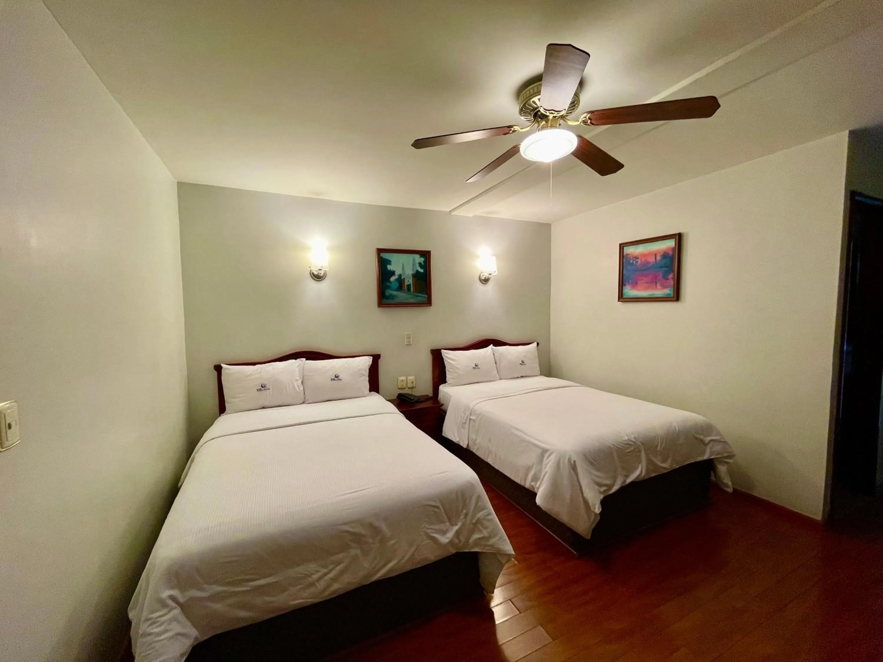 Bed in Hotel Puebla Plaza