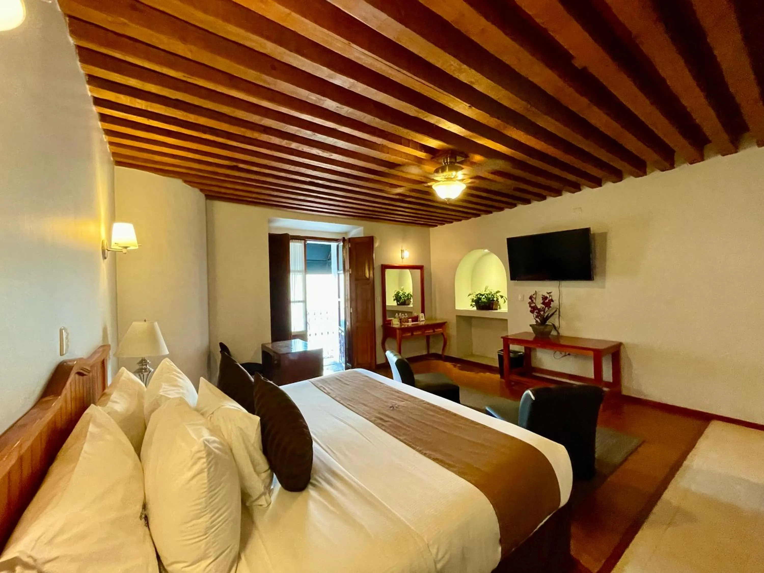 Bed in Hotel Puebla Plaza