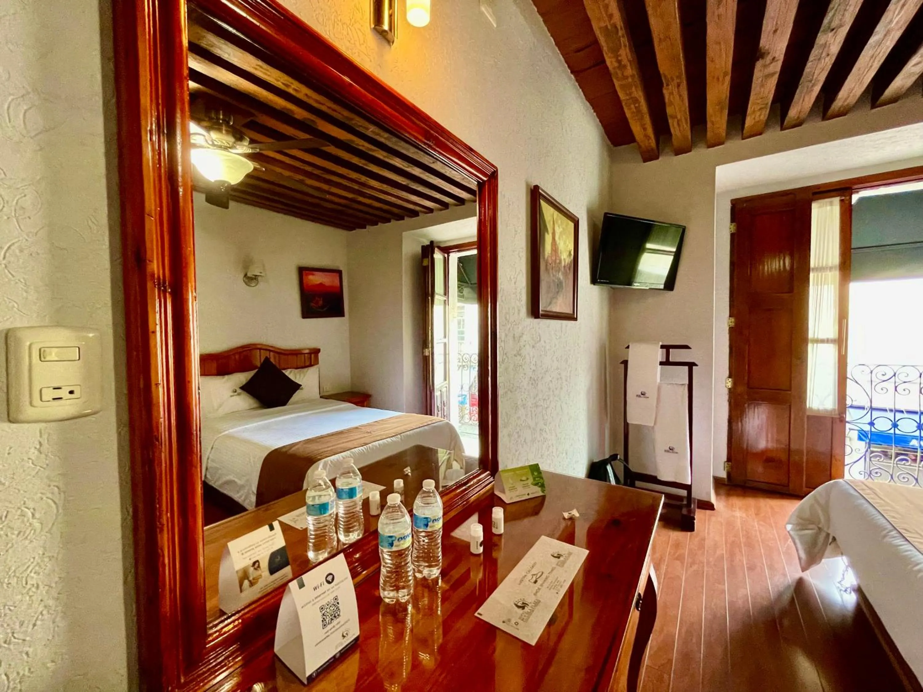 Bed in Hotel Puebla Plaza