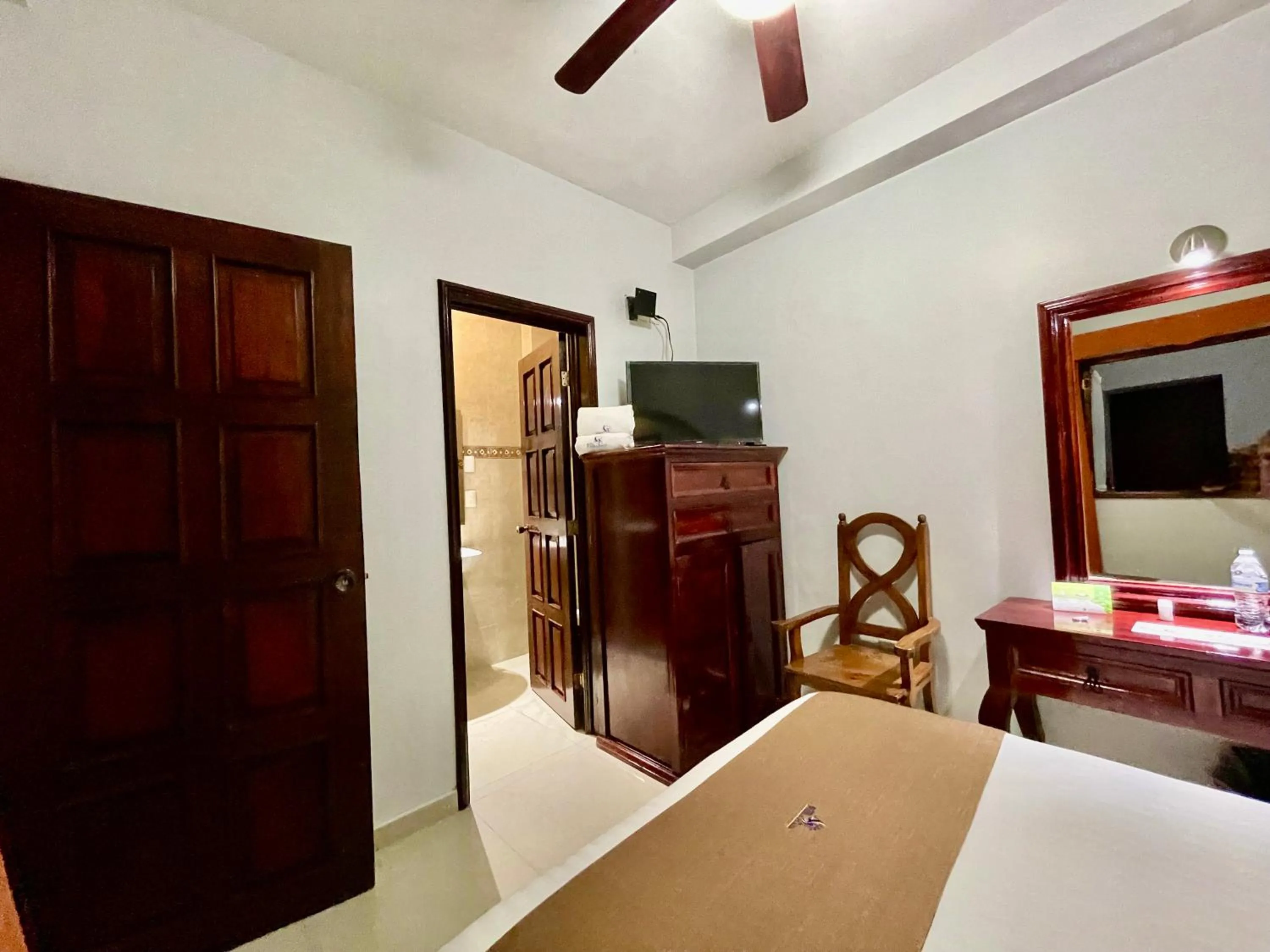 Bed in Hotel Puebla Plaza