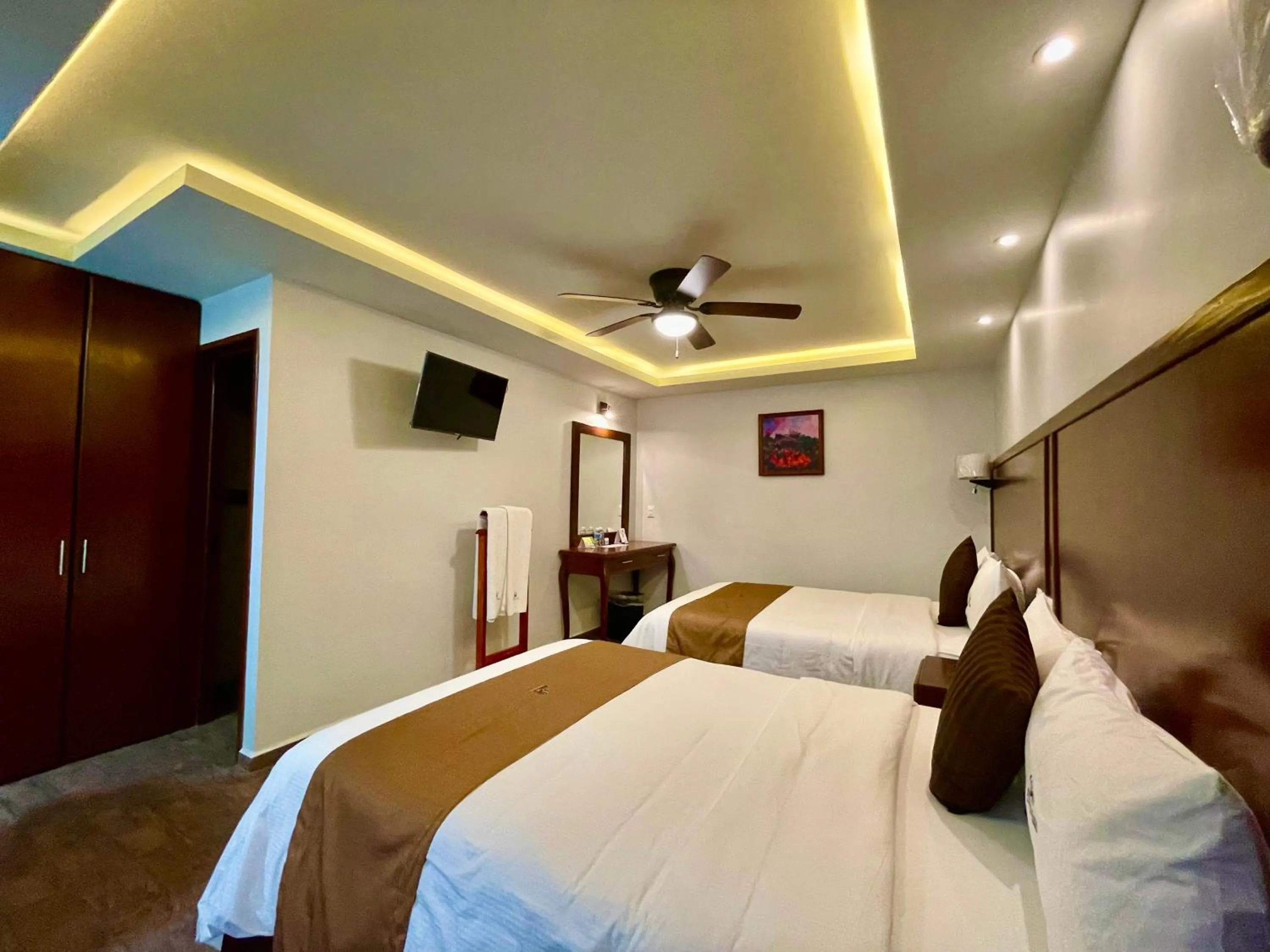 Bed in Hotel Puebla Plaza