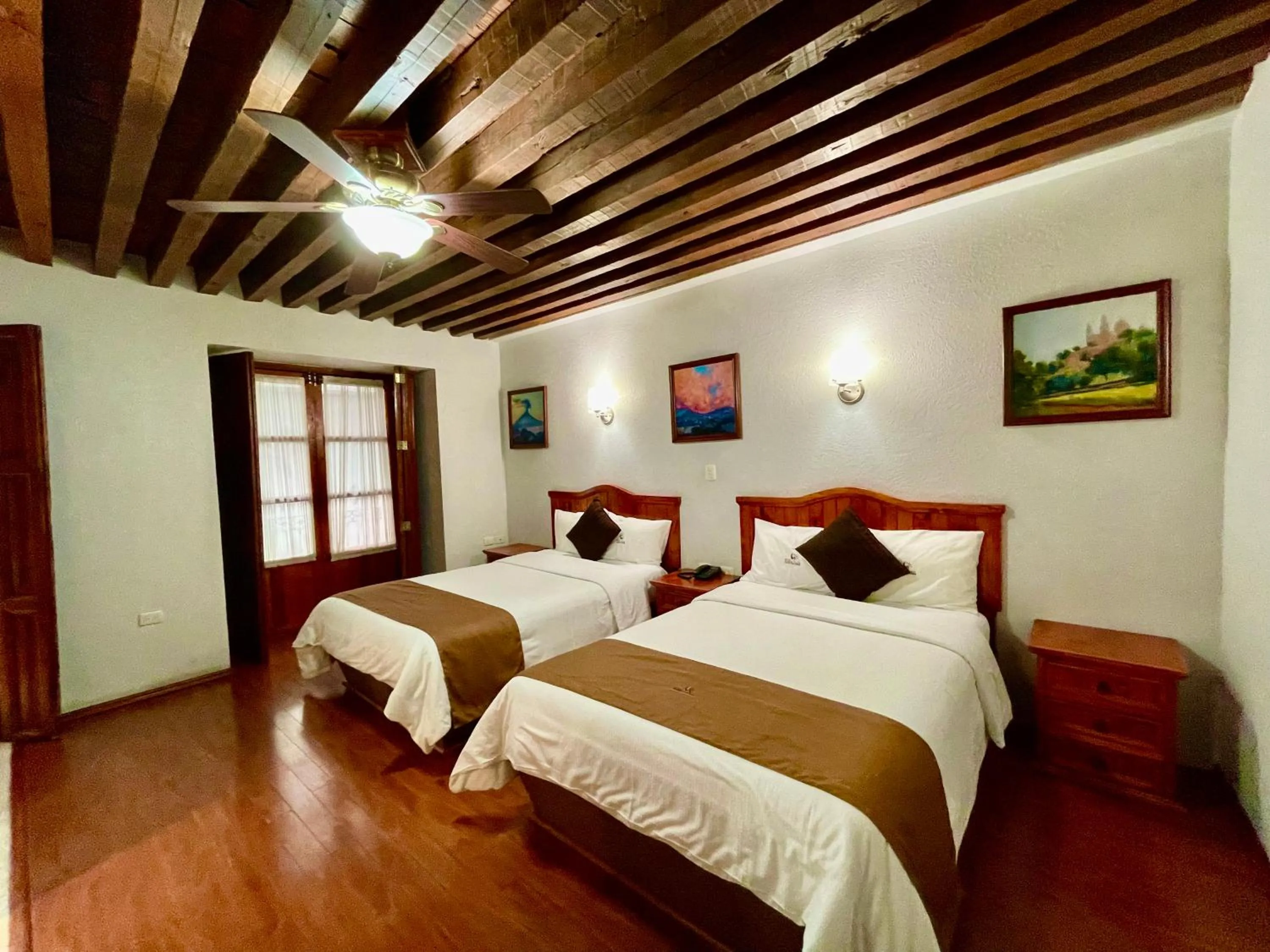 Bed in Hotel Puebla Plaza