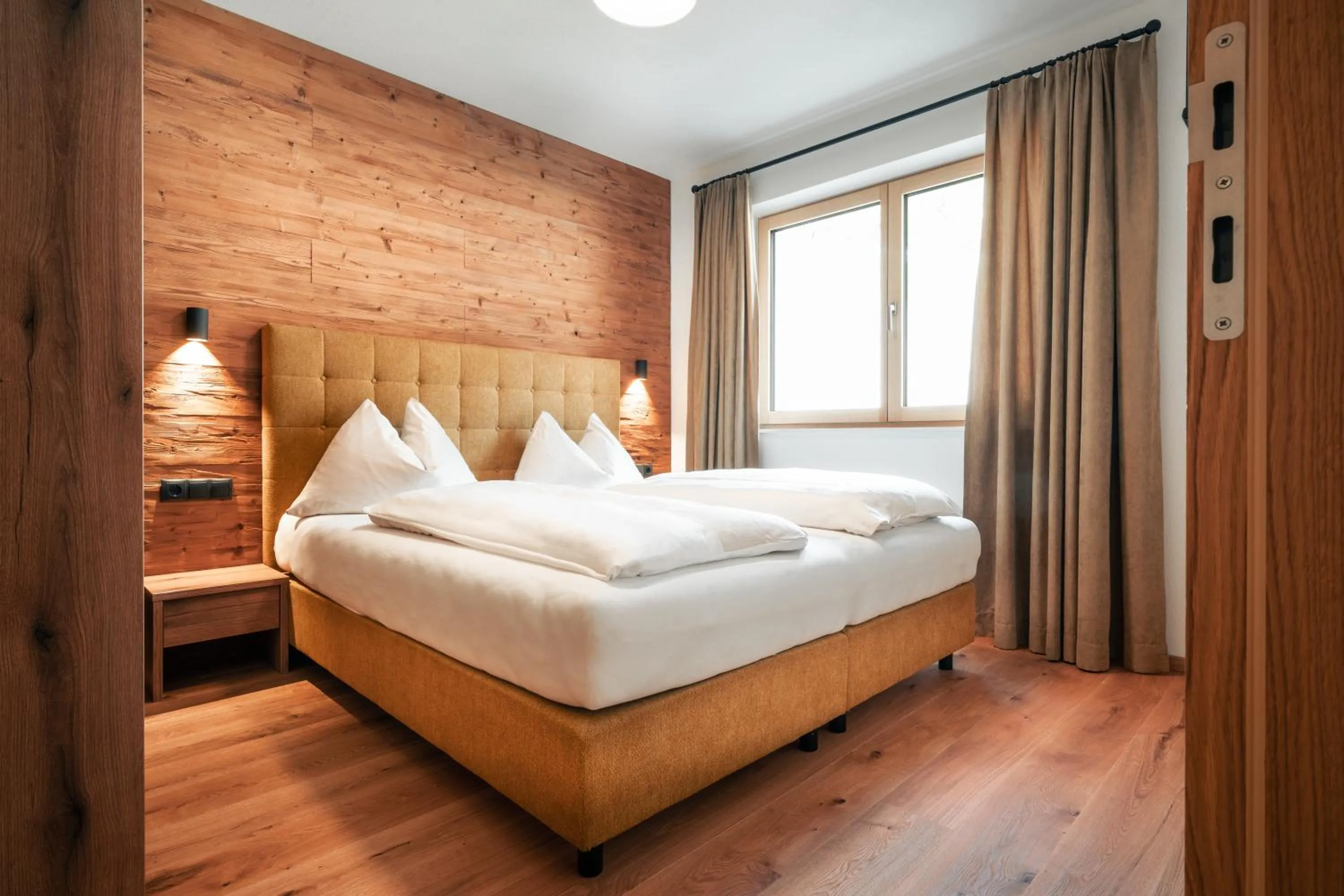 Bed in Sun Side by Schladming-Appartements