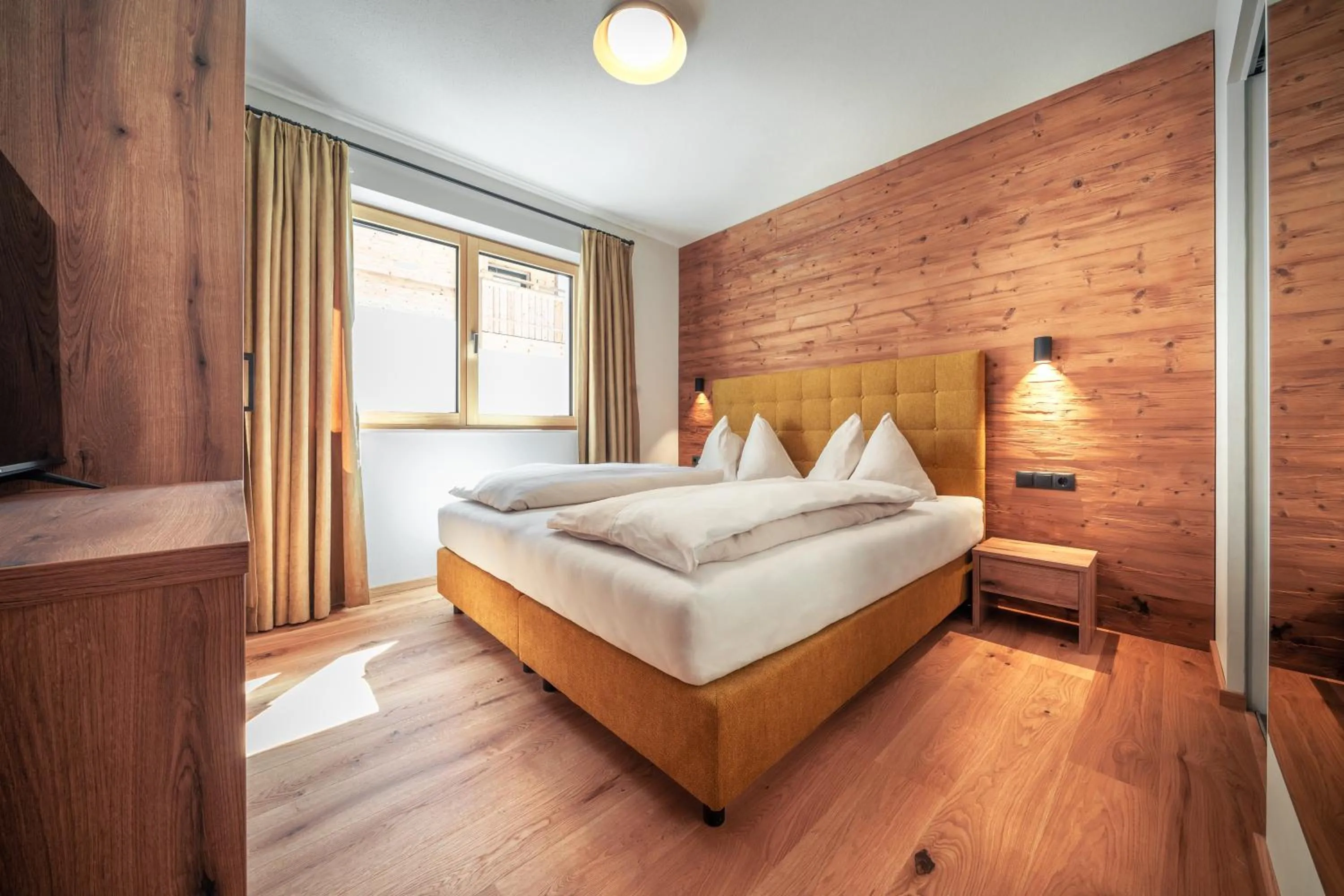 Bed in Sun Side by Schladming-Appartements