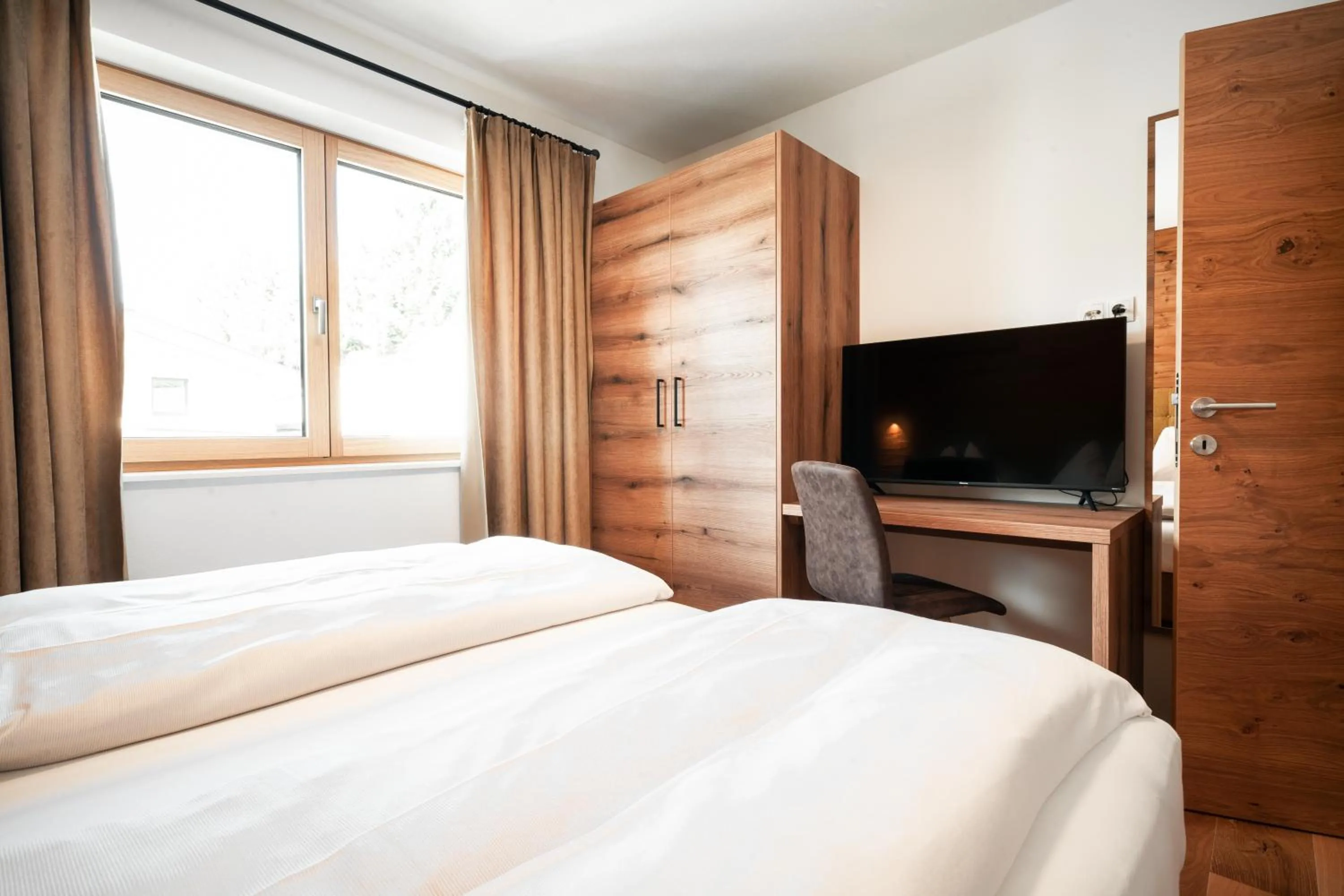 Bed in Sun Side by Schladming-Appartements